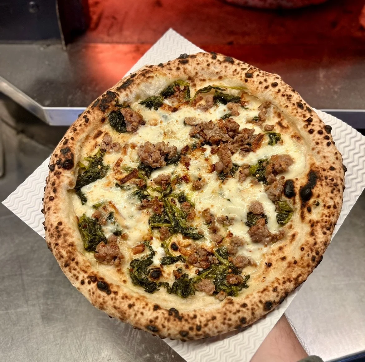 March special: Salsiccia &amp; Friarelli

A proper Neapolitan classic 🇮🇹🍕

Fior di latte &amp; smoked mozzarella
Italian sausage
Neapolitan broccoli (friarelli)
Parmesan
Chilli flakes

Rich, smoky, slightly bitter and just a little heat 🌶️

Avail