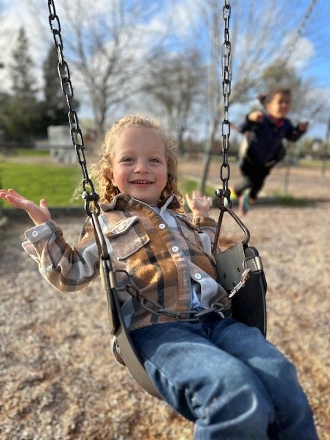 Storey on swing.jpg