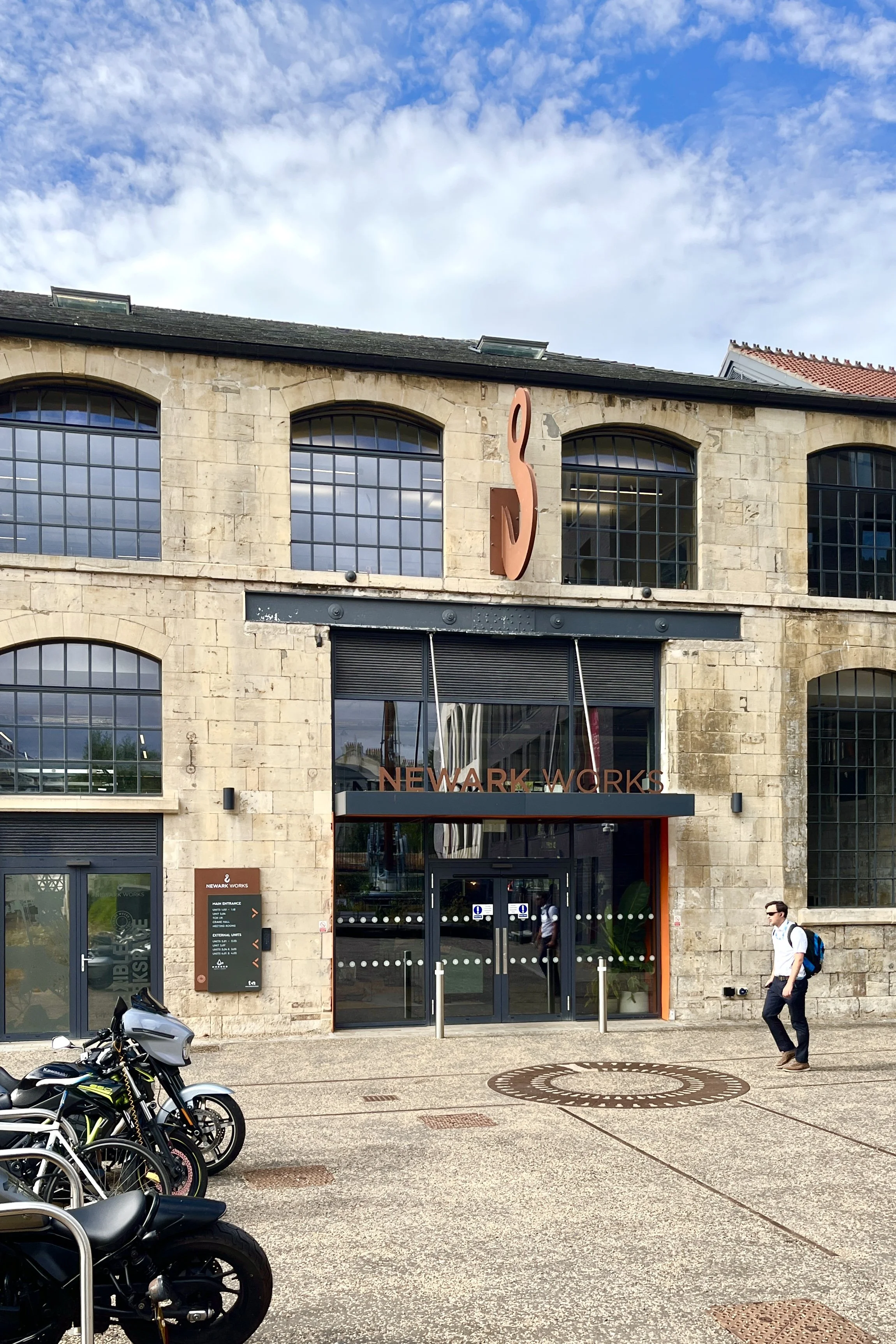 Photo of the front entrance to our offices in central Bath, located in the Newark Works converted crane factory.