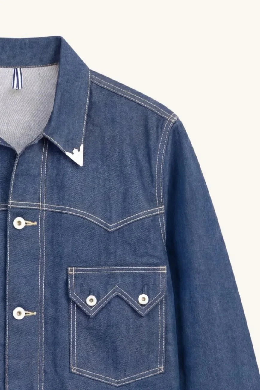 Detail of selvedge denim western jacket collar with detachable metal points