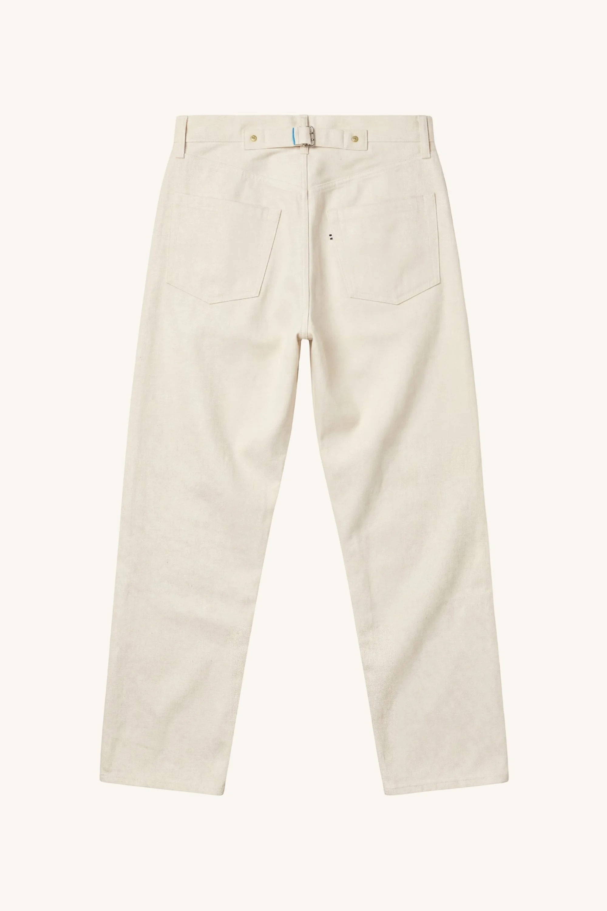 Back view of the Selvedge Denim Jeans in ecru showing back cinch buckle and rear pocket placement.