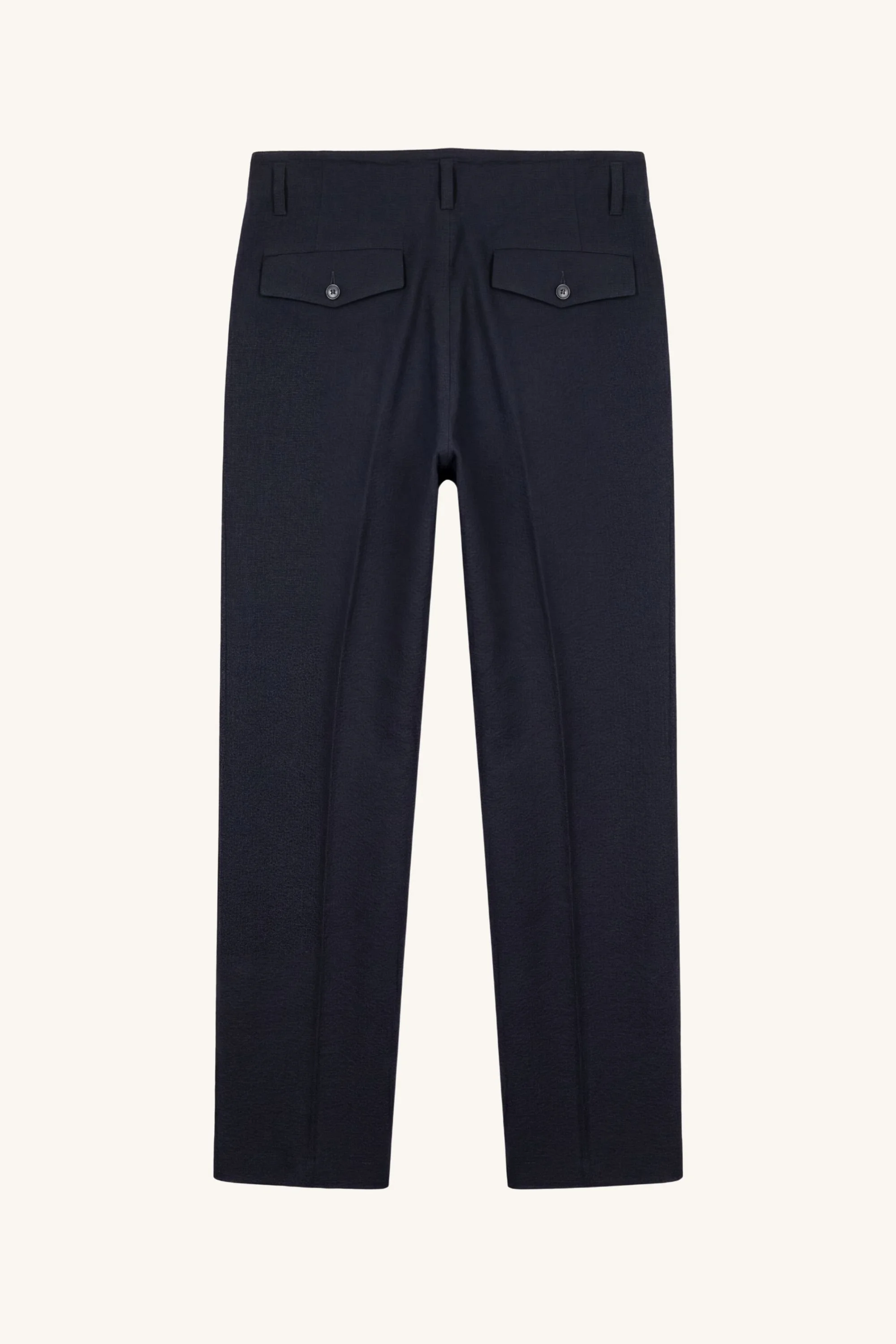 Back view of [ko'lon] black seersucker Military Chino highlighting clean rear construction and tailored workwear silhouette