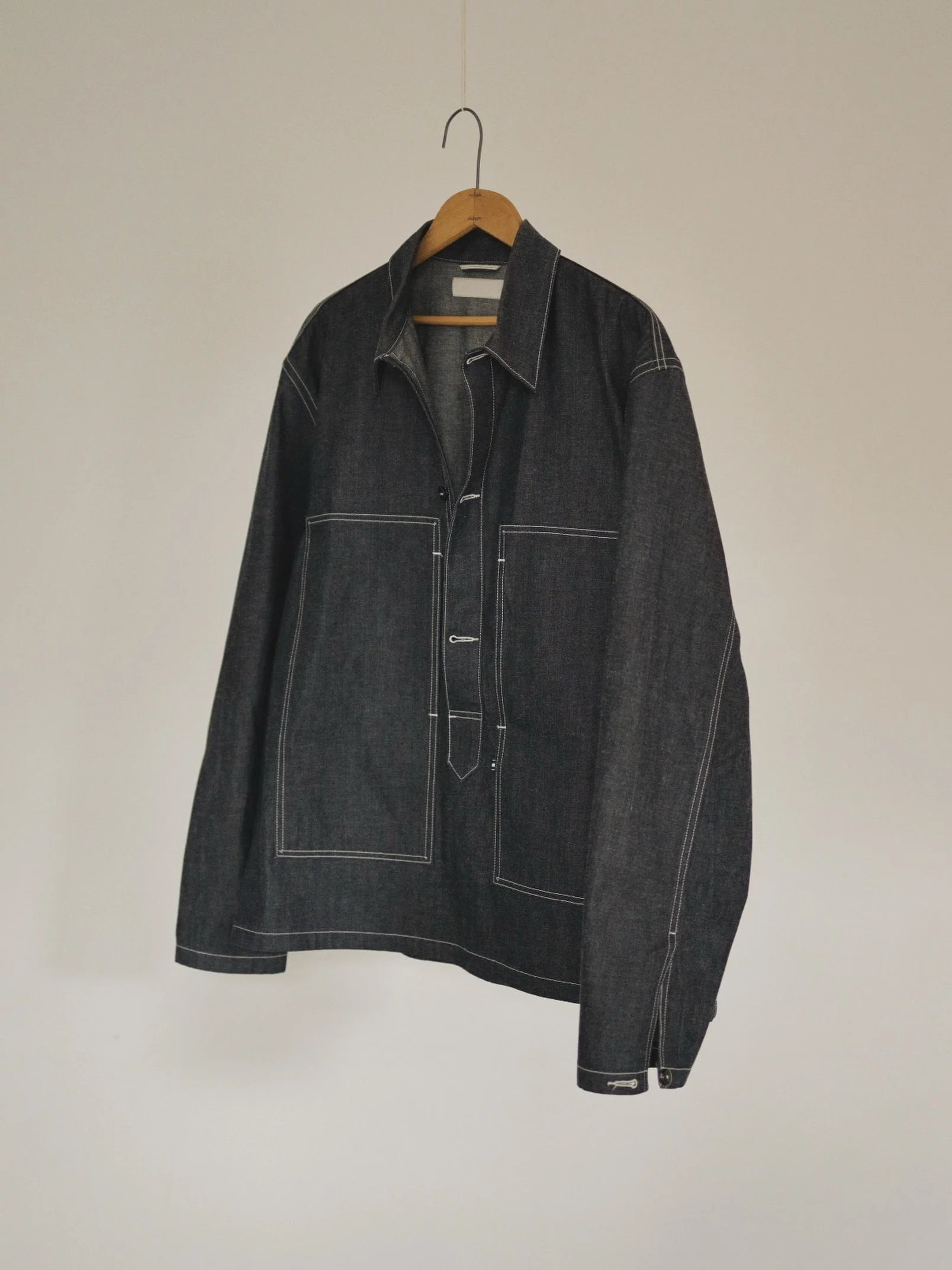 Our version of this historical American garment the 6-125A denim pullover. 
It was originally paired with a denim fatigue trouser called the 6-124A.
Although we offer this shirt in a few materials, we will be releasing a matching set with our version