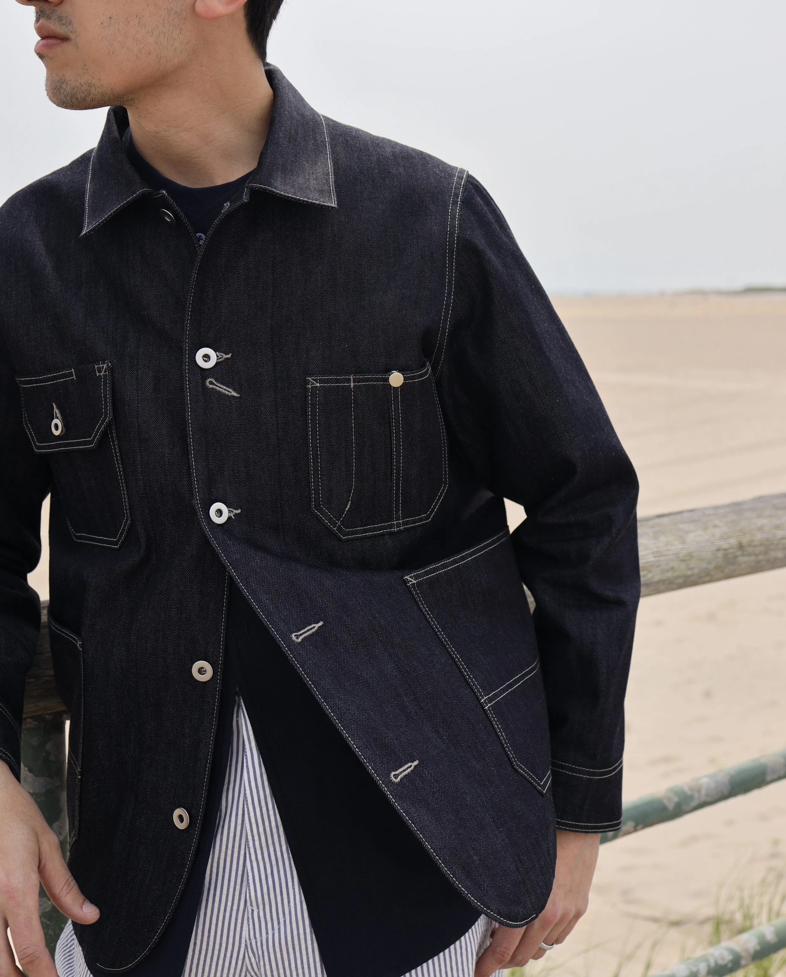 Detail of indigo selvedge denim fabric on Remington coverall jacket