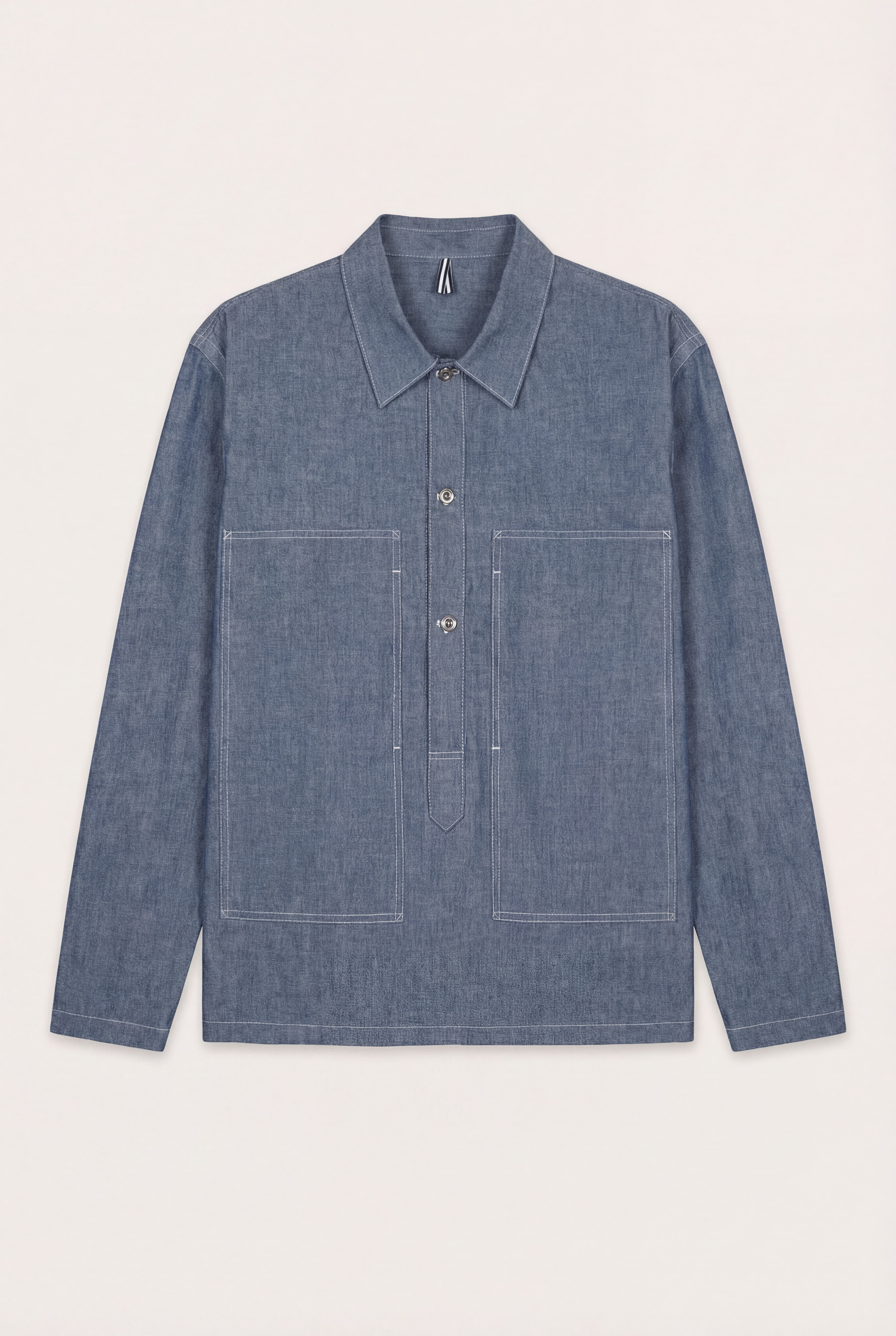[ko'lon] Bennet Popover Chambray shirt made from cotton chambray, featuring two front pockets and handcrafted construction