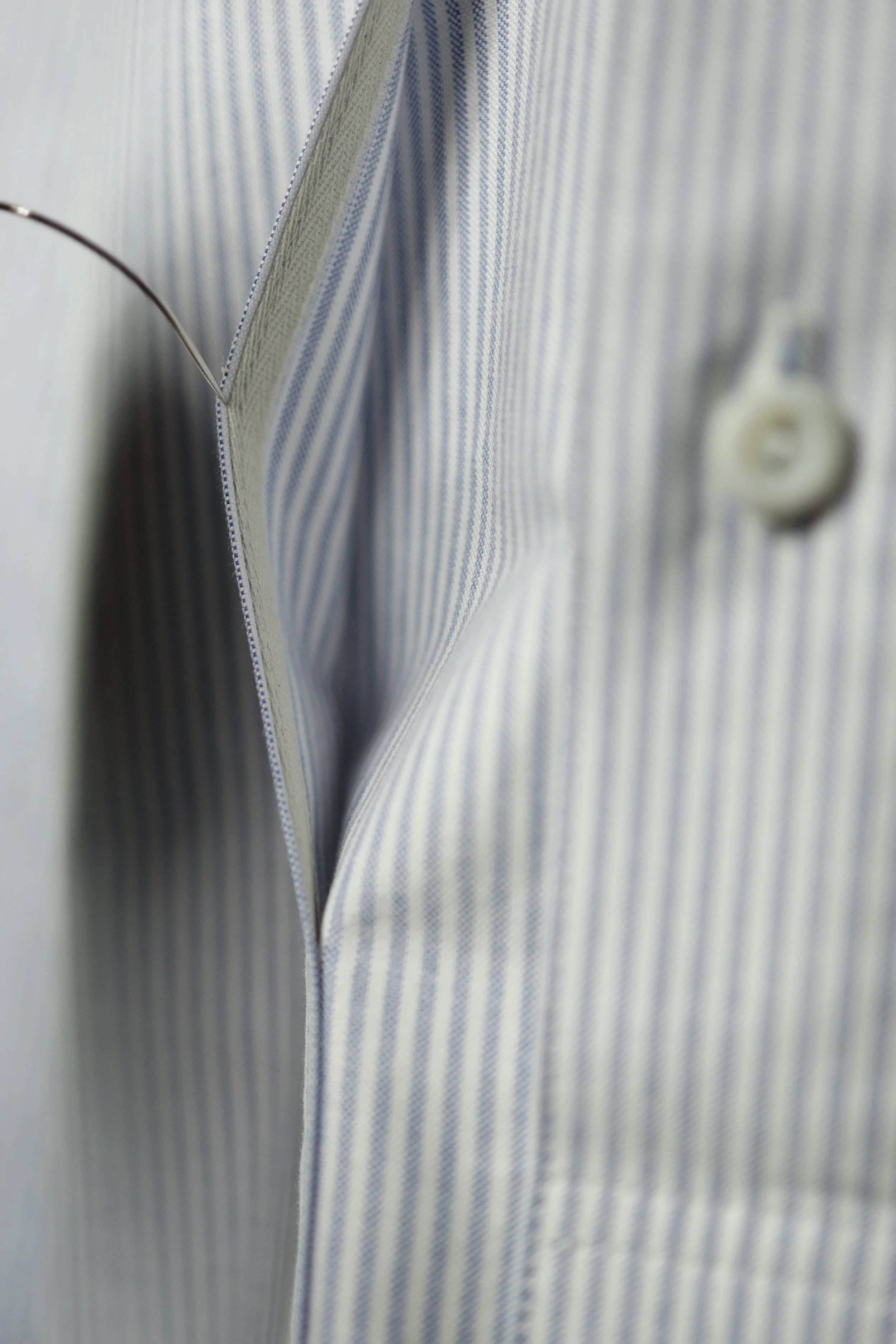 Ocean Blue Cotton Oxford Pullover Shirt pocket detail showing oversized utility pocket construction and finely woven blue striped Oxford cotton fabric.