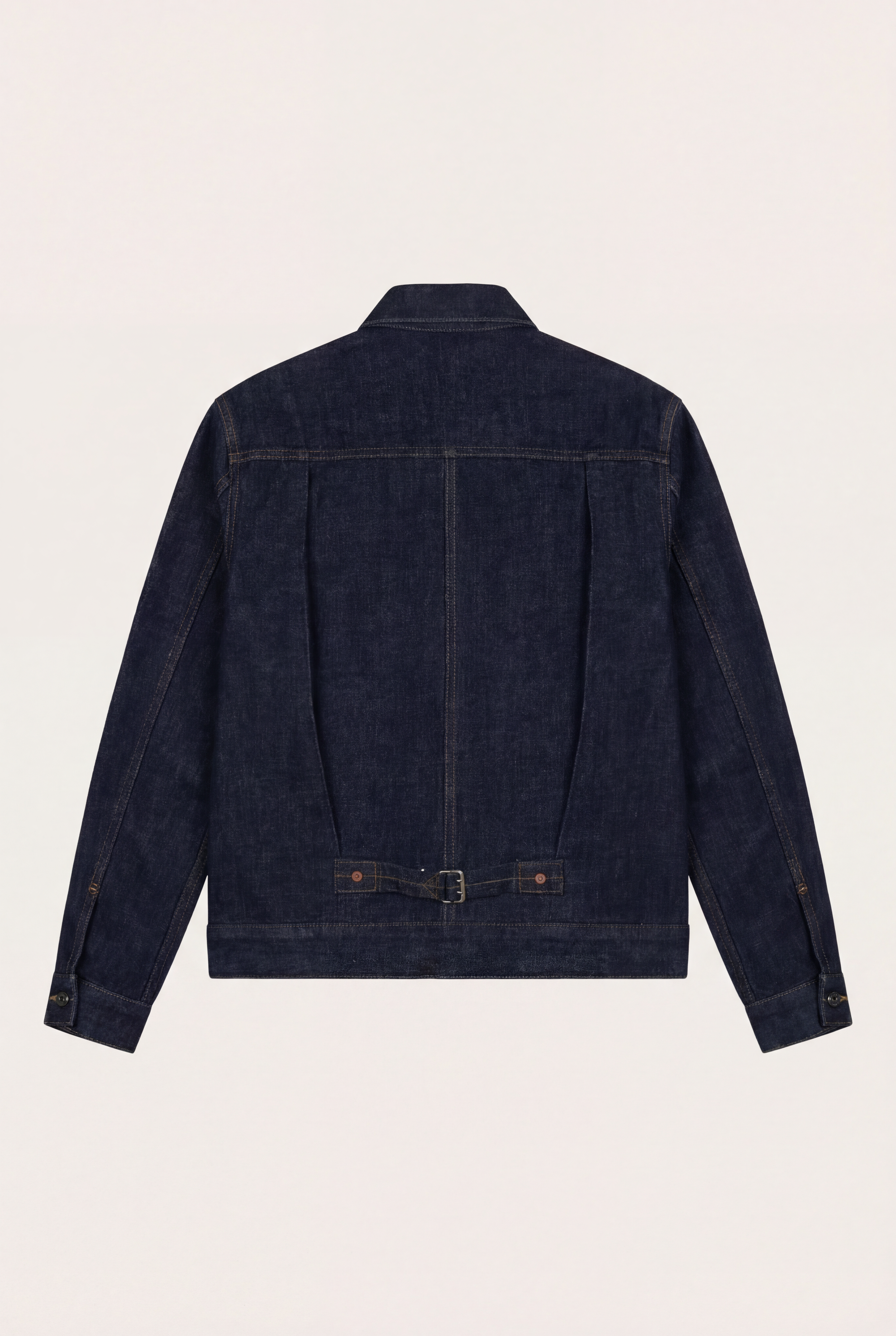 Back view of [ko'lon] Type 1 Selvedge Denim Jacket highlighting cinch‑back detail and clean panel construction