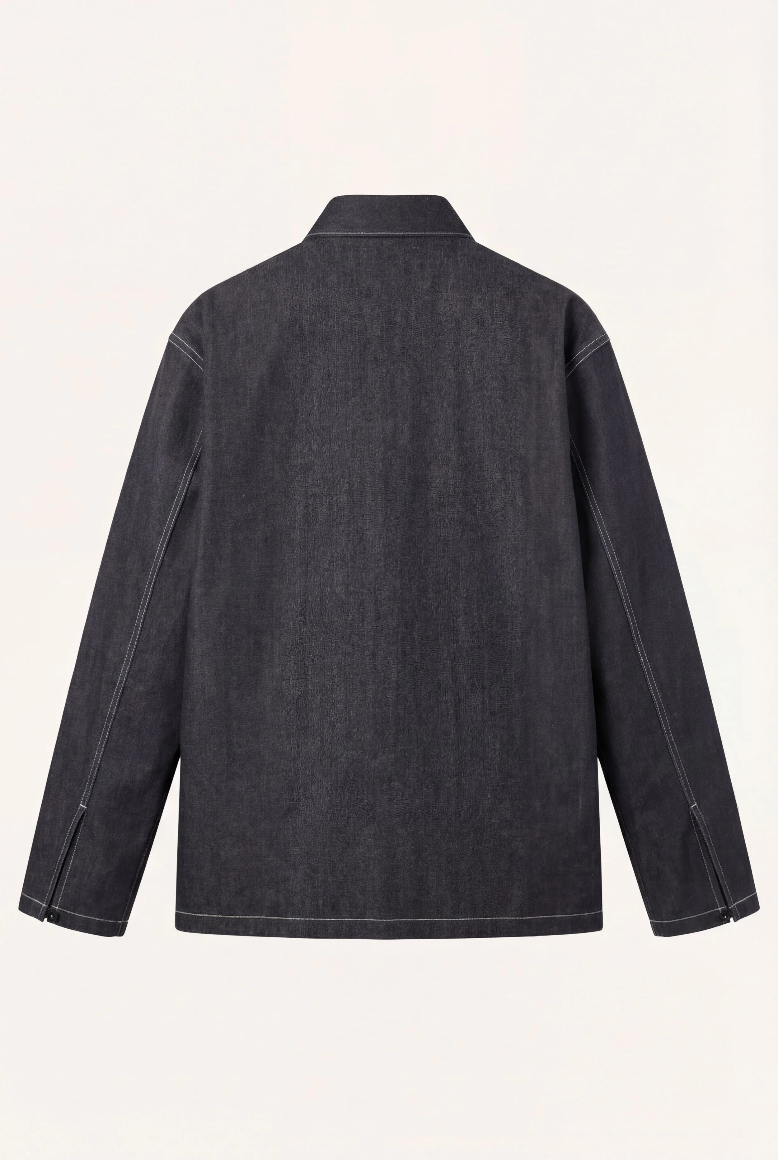 Back view of [ko'lon] Type US Army Denim Popover highlighting clean back panel construction and straight hem