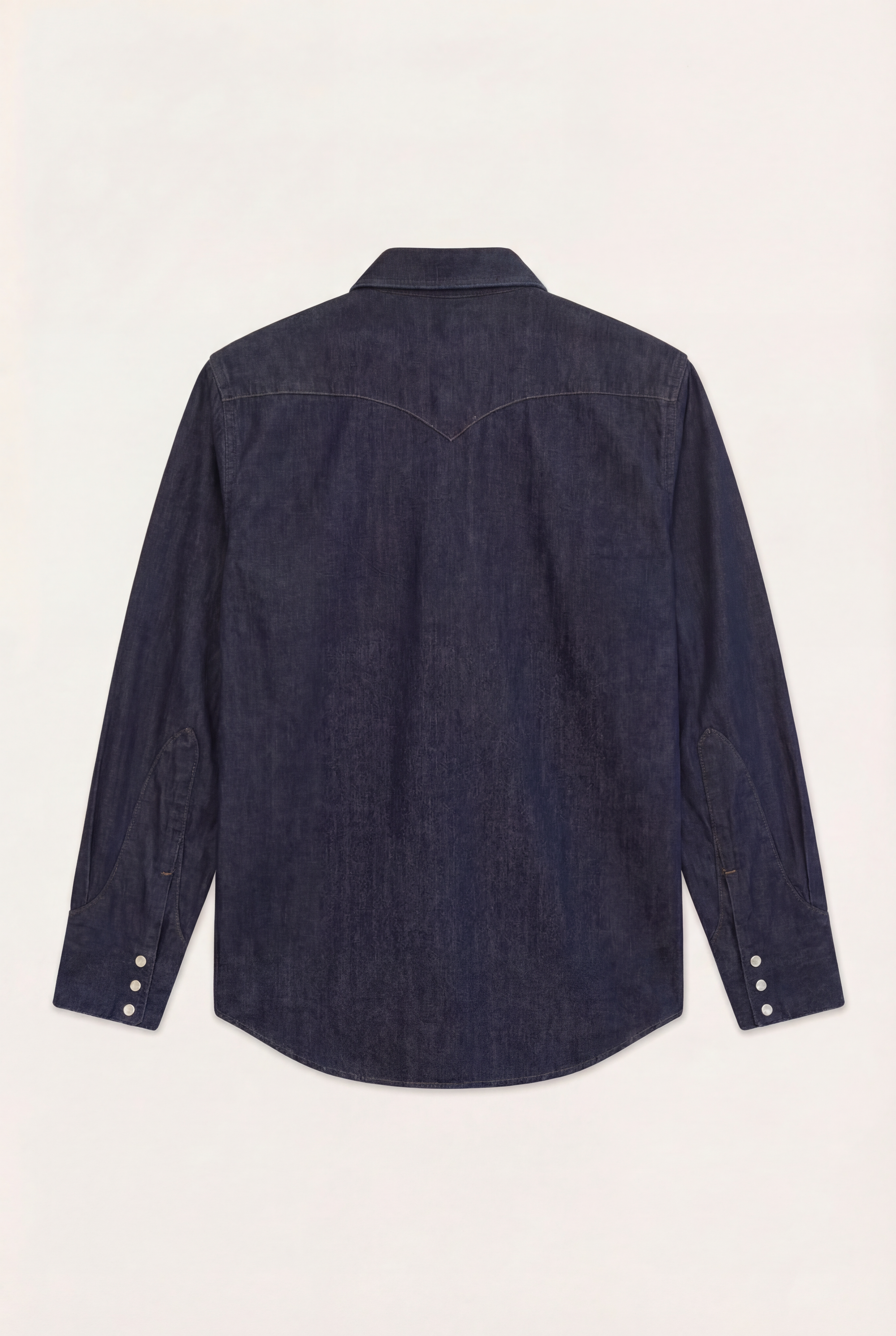 Back view of [ko'lon] Bronco Western Denim Shirt highlighting western back yoke and clean panel construction