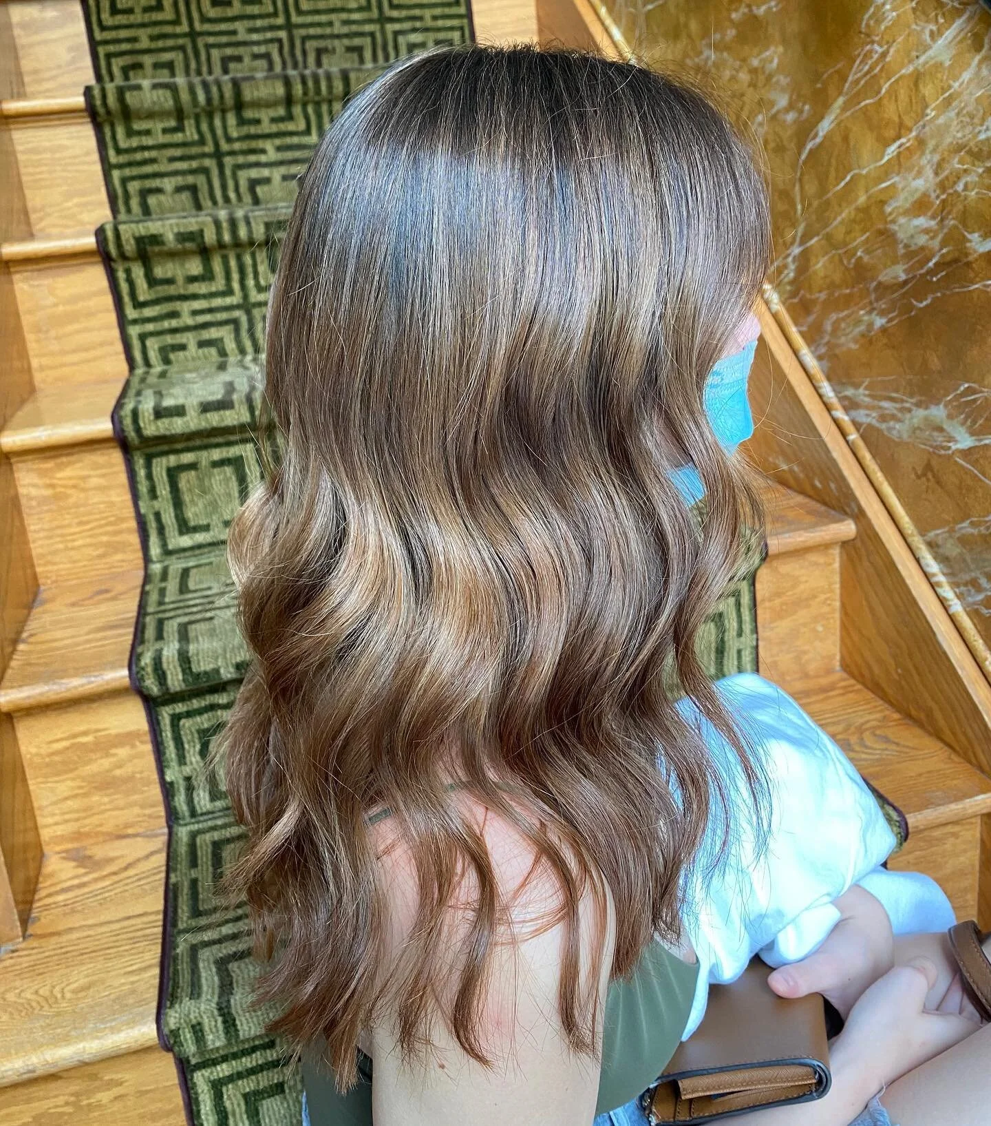 Highlight-lowlight combo by Alyssa today for a natural-looking auburn result! #highlightlowlight #colourhighlights #brunette #auburnhair #curls #aveda #avedacolor