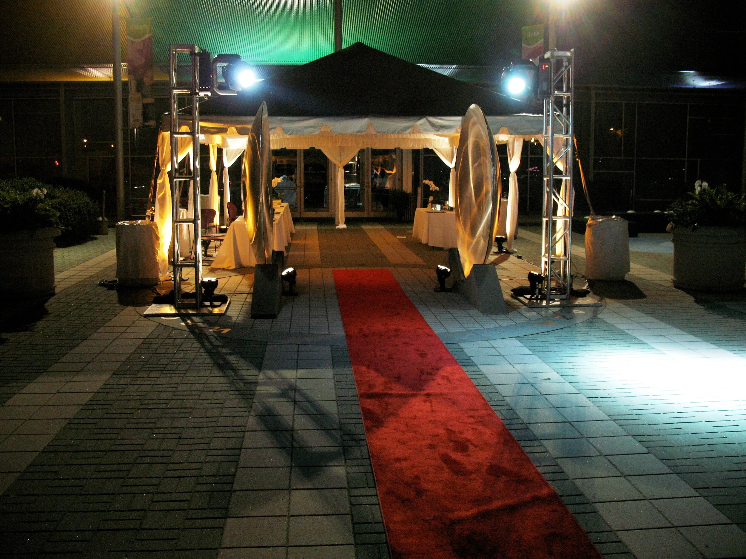 outdoor red carpet and tent setup
