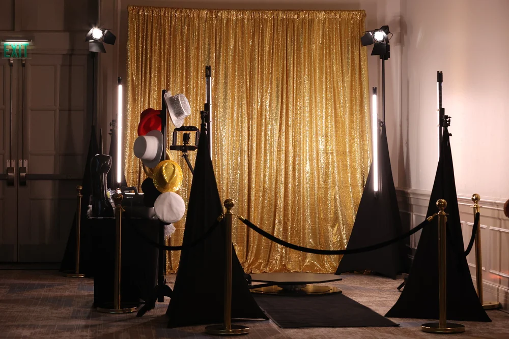 OneAway 360 video booth setup with a black and gold theme