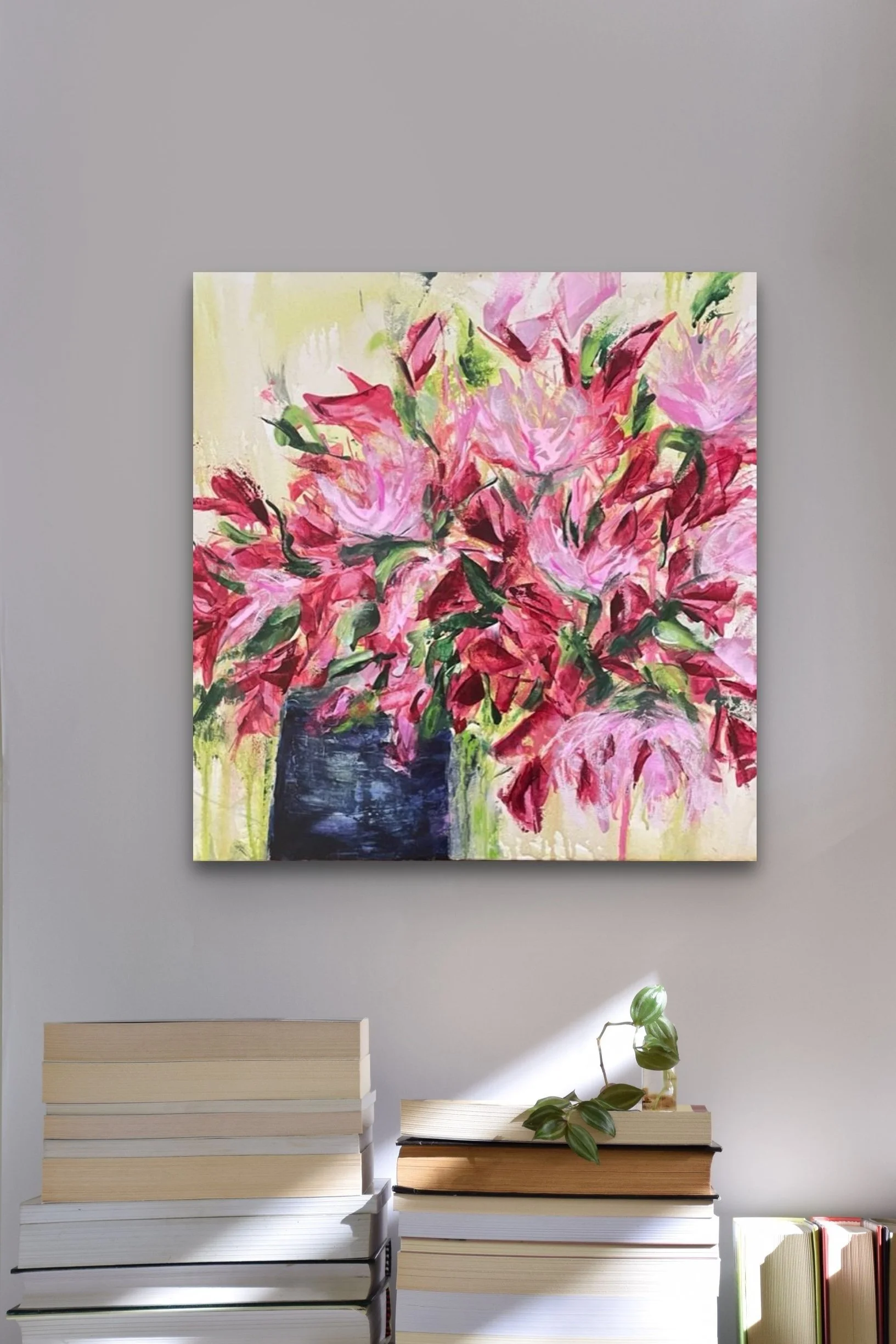 Red+and+Pink+Bloom+over+stacked+books.jpg