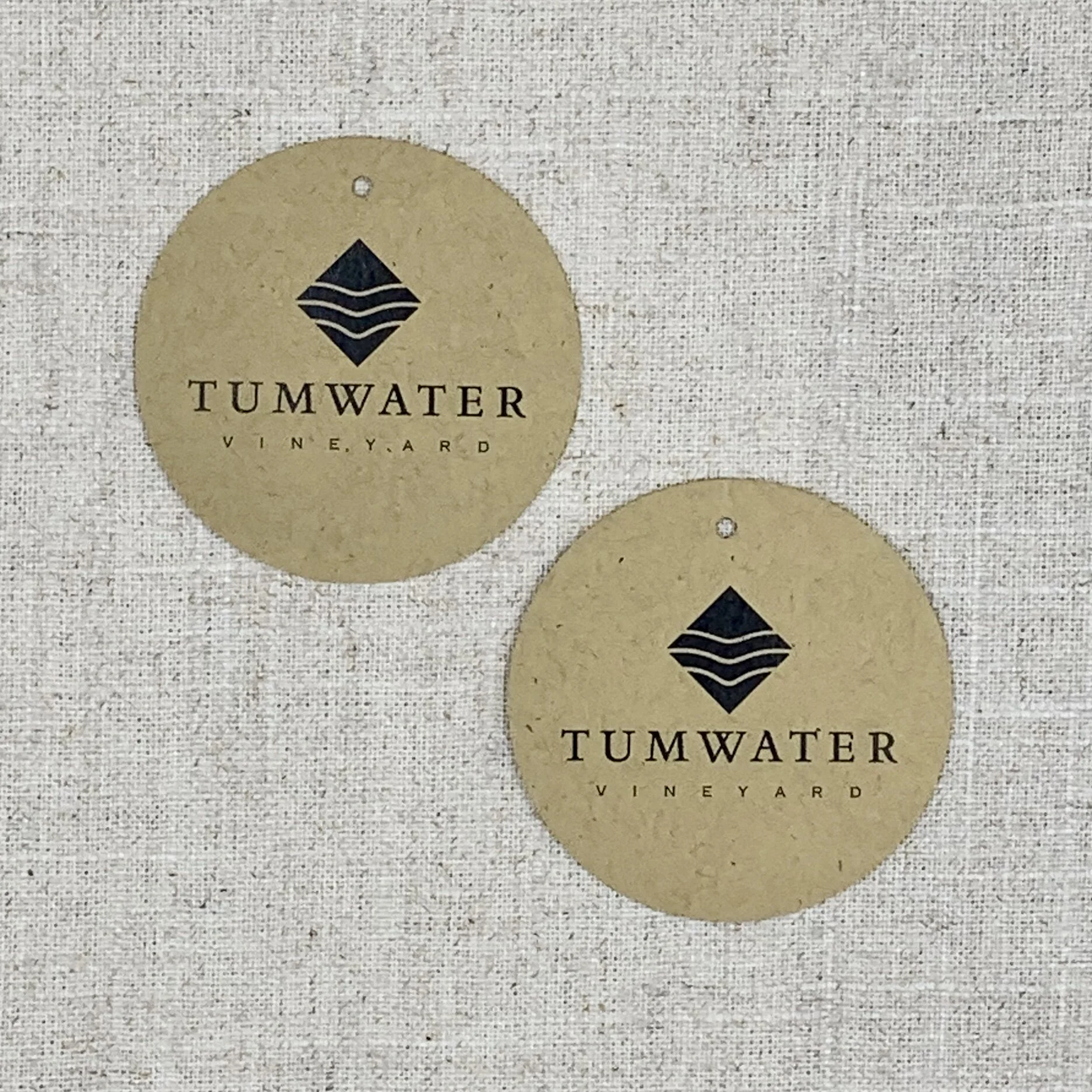 Looking to extend your brand? Wine tags are a simple way to promote your business, whether you sell wine or not! Paper Moon Shop can create custom tags featuring your logo to match your product. Tumwater Vineyard in West Linn, Oregon, asked us to des