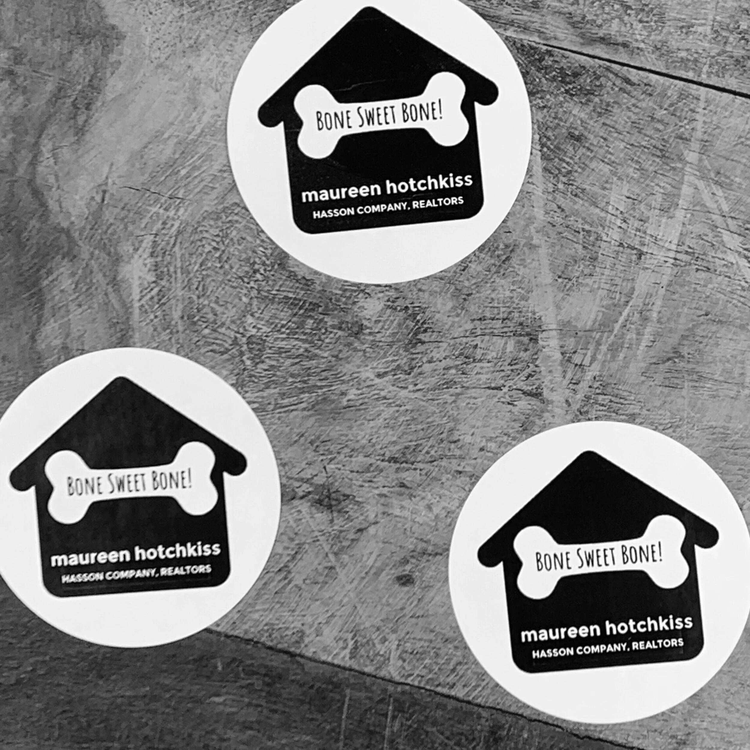 
At Paper Moon Shop, we support small, self-owned businesses with creative marketing ideas. A local realtor used the tagline "Bone Sweet Bone" to spoil her clients' dogs. We created round labels with her graphic, which she placed on bags of dog bones