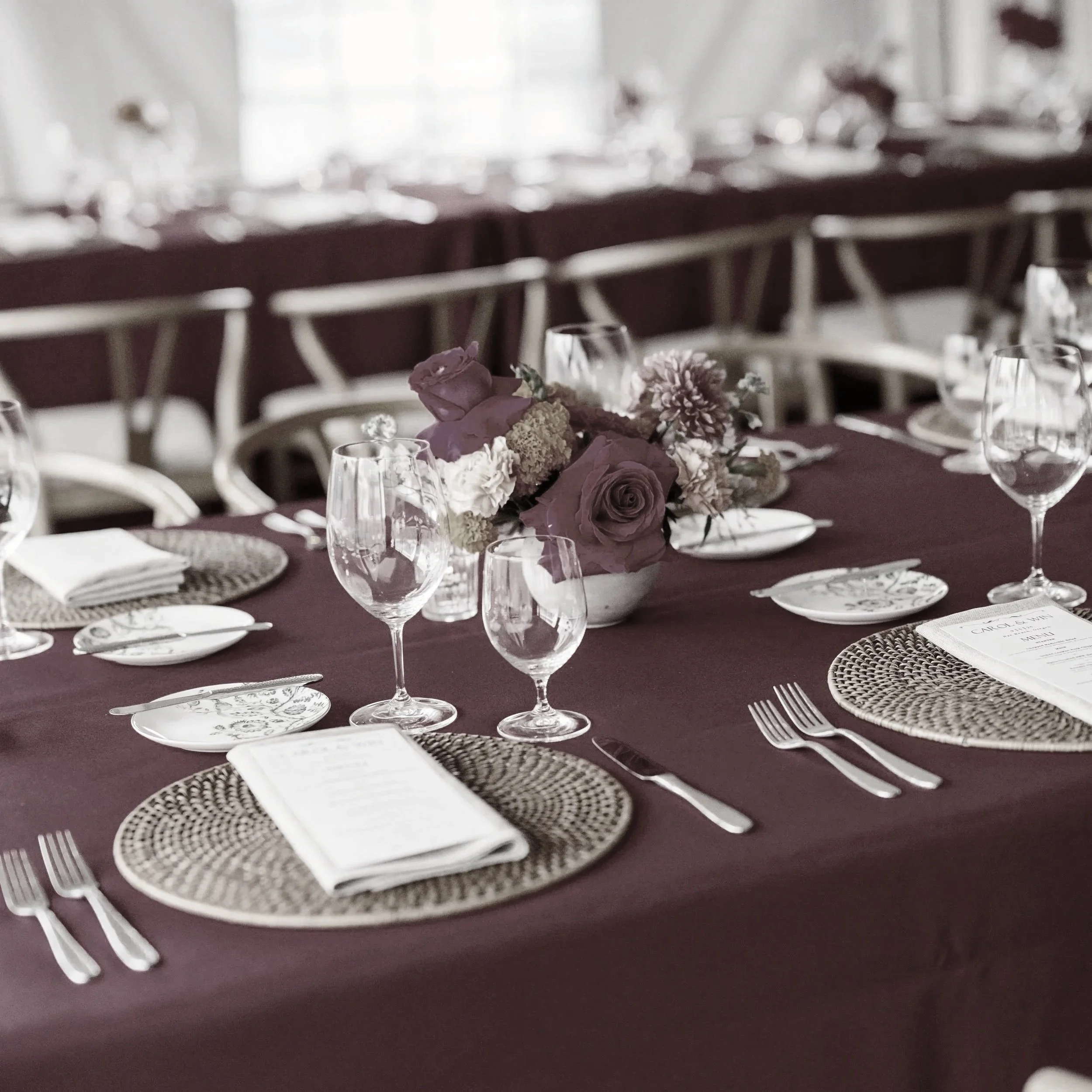 As of late, we have noticed that wedding celebration dinners can be bold!  The groom's favorite color at this reception was deep red.  We created table and bar menus to blend with the bright decor to get guests in a festive party spirit. 