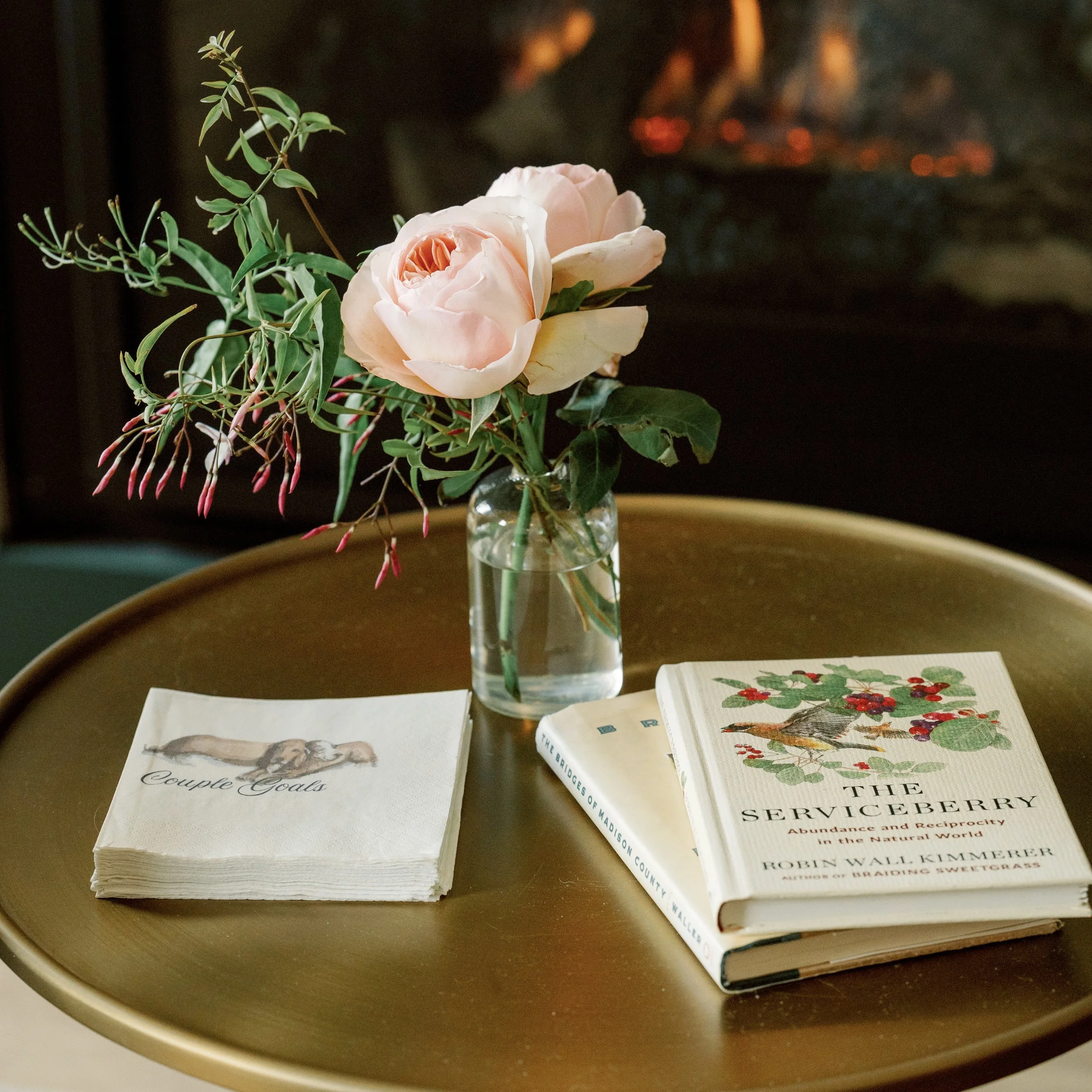 Custom napkins add personality and charm to events. Using a watercolor of the couple’s dogs, we created cocktail napkins with their initials. The extras were taken home as a fond reminder of the day.