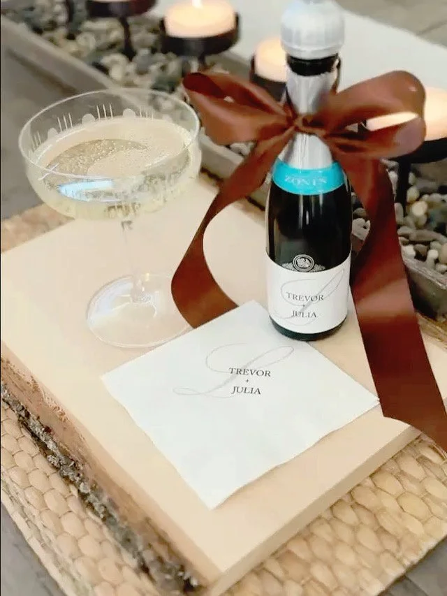 We love designing customized napkins with the stationery suite's fonts and colors to tie it all together when the bubbles start flowing! We also recommend making them without a date, so in case you have extras you can use them well after the big cele