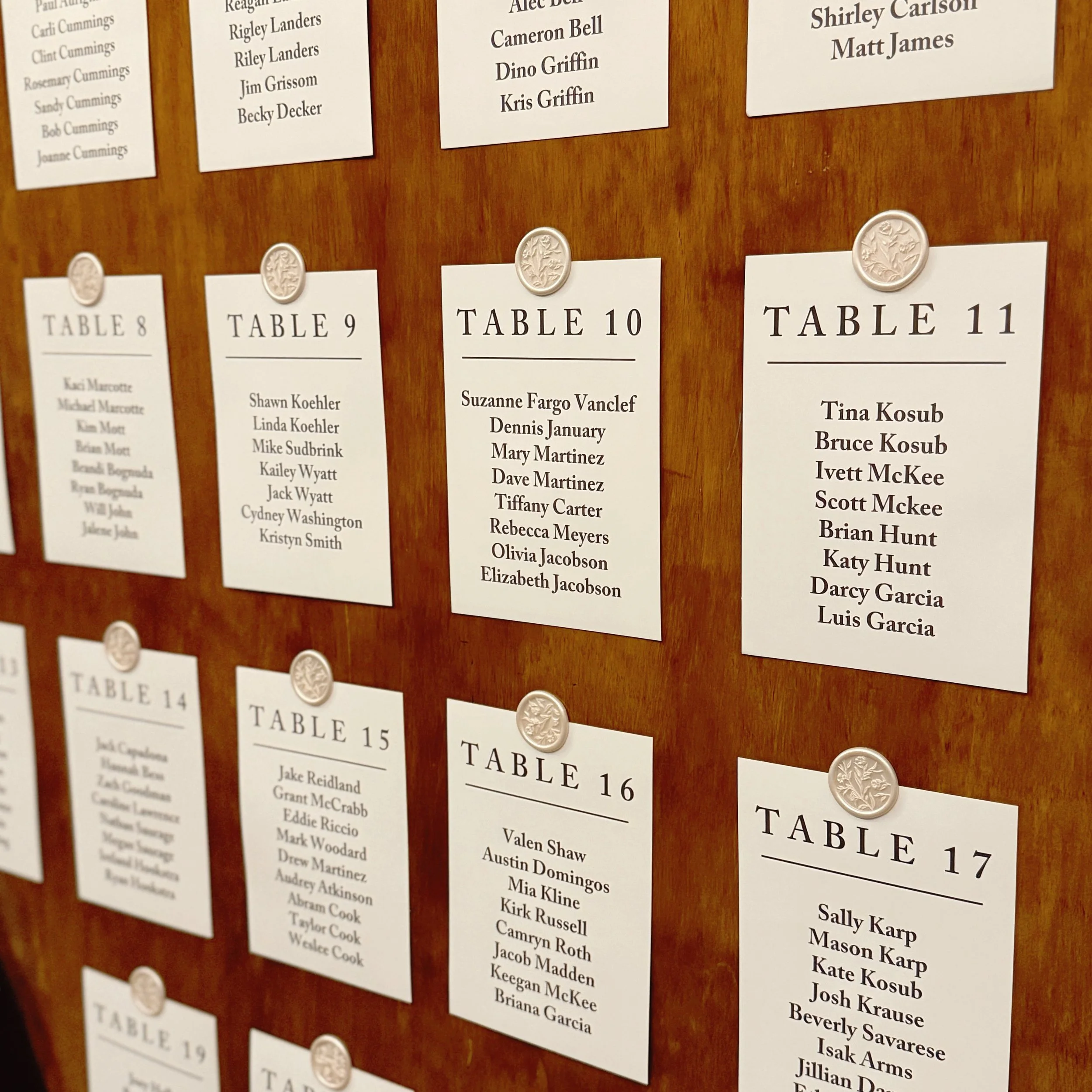 Traveling for a wedding? Choose a flexible, pop-up seating chart. We print individual table cards your wedding team can easily set up. They pack neatly into an envelope perfect for destination weddings. This bride added an adhesive seal to attach tab