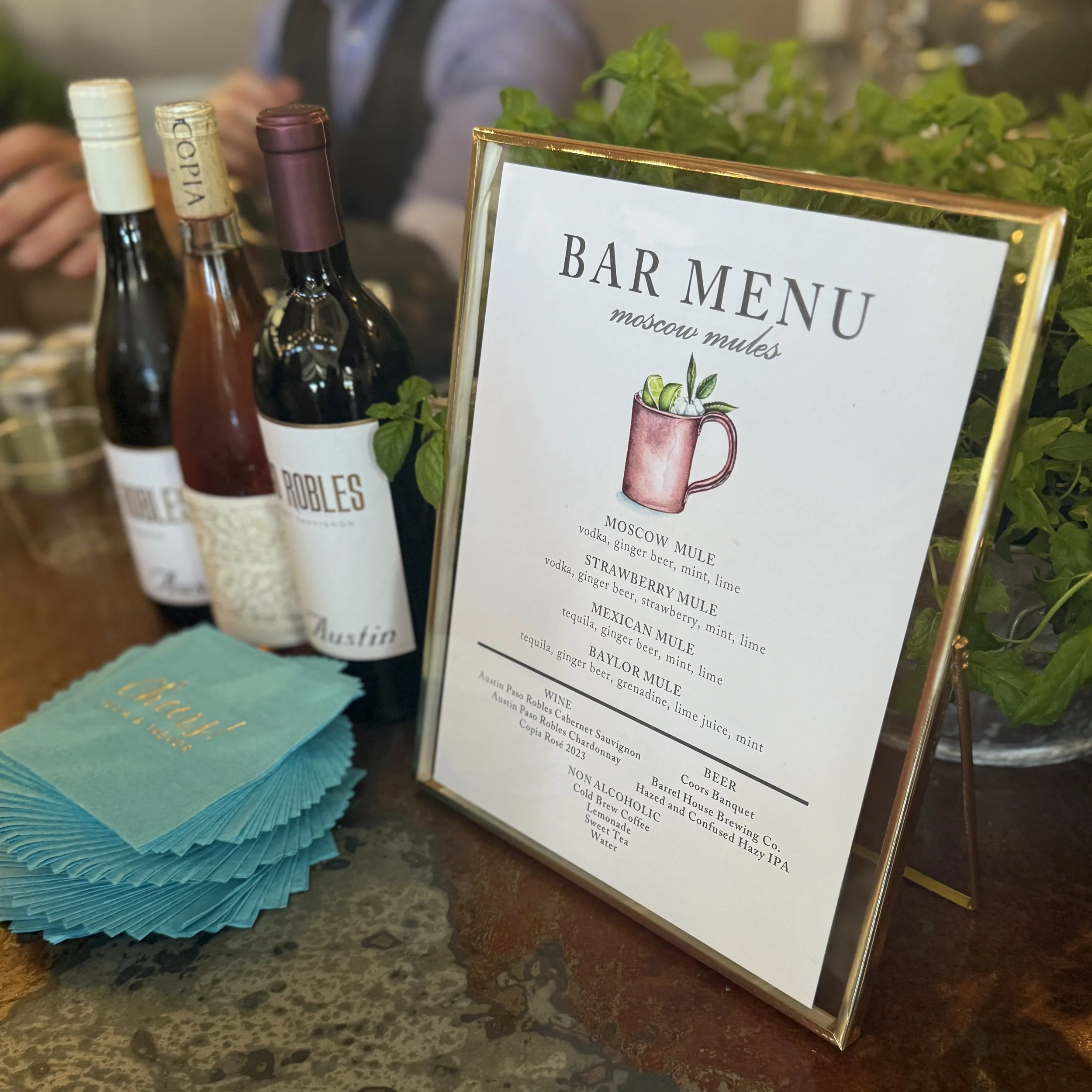 We love helping design bar menus for events.  This bride wanted themed moscow mules.  She suggested a watercolored one at the top with each cocktail the bar tenders were planning below.  Plus, she knew others may want wine and beer.  This allows the 
