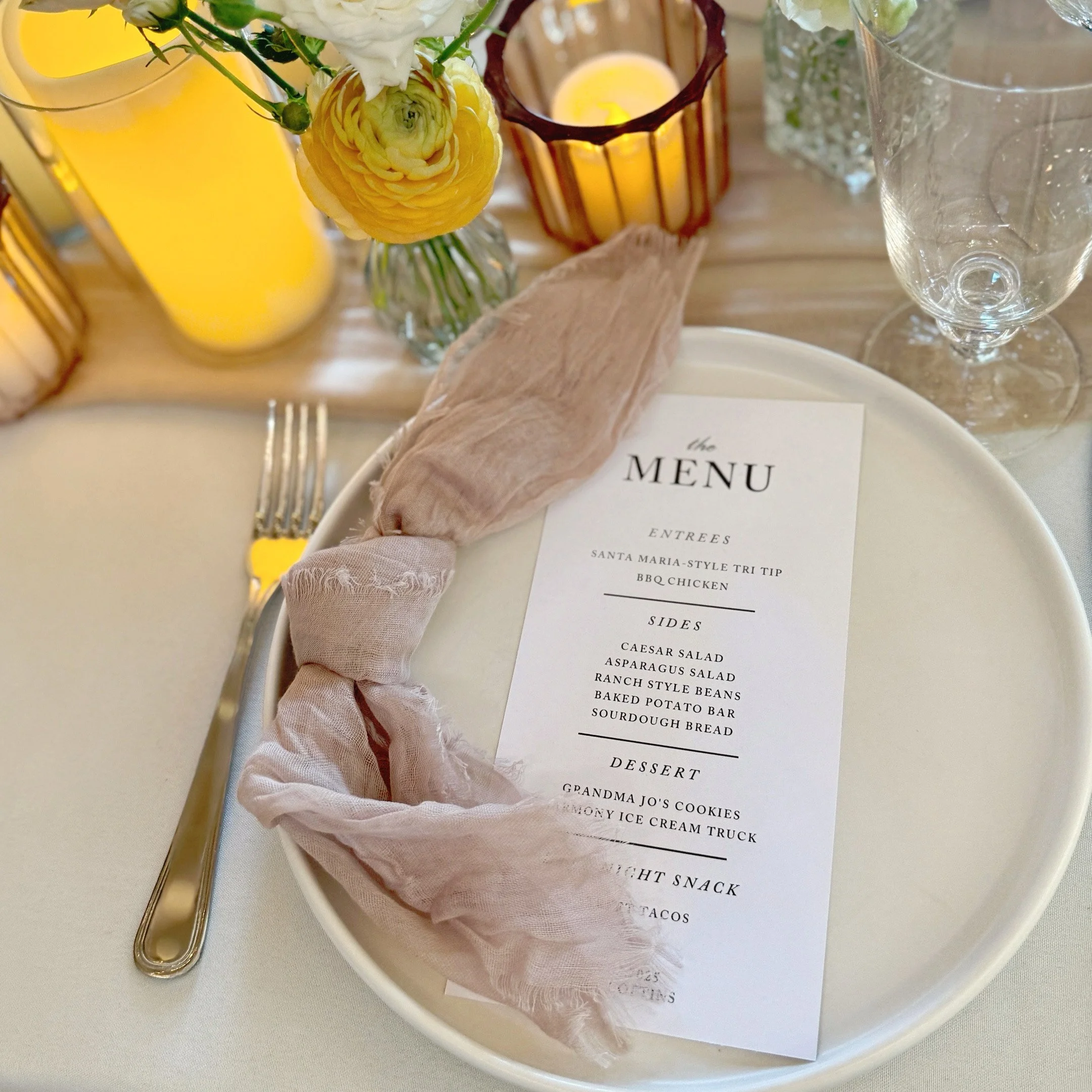 Get your guests excited to know all the well planned food about ready to come their way!  Adding a menu to each plate that matches all the stationery elevates the table and allows them to see what is in store for the special celebration. 