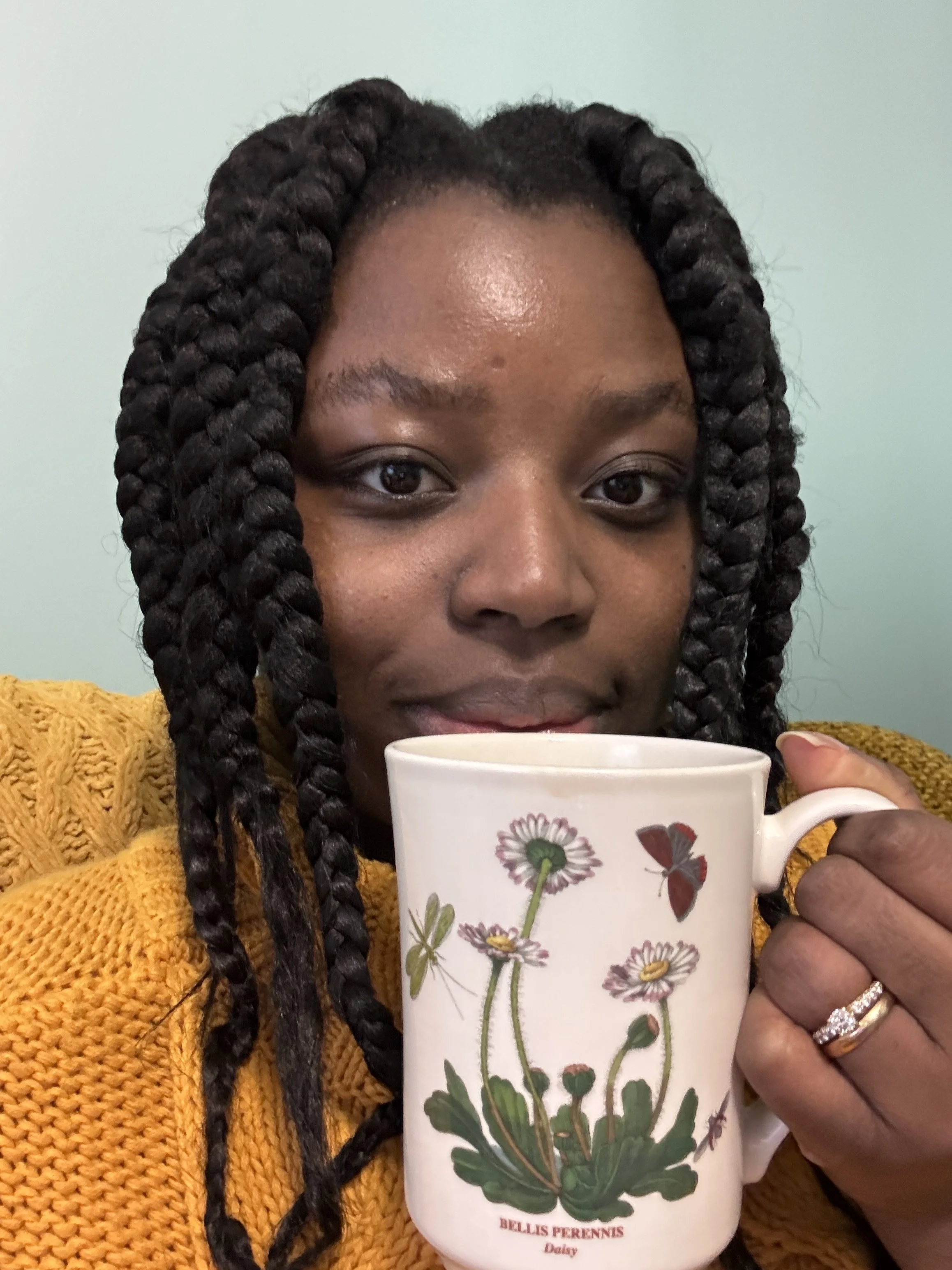 Me drinking  tea in my recently completed she-shed