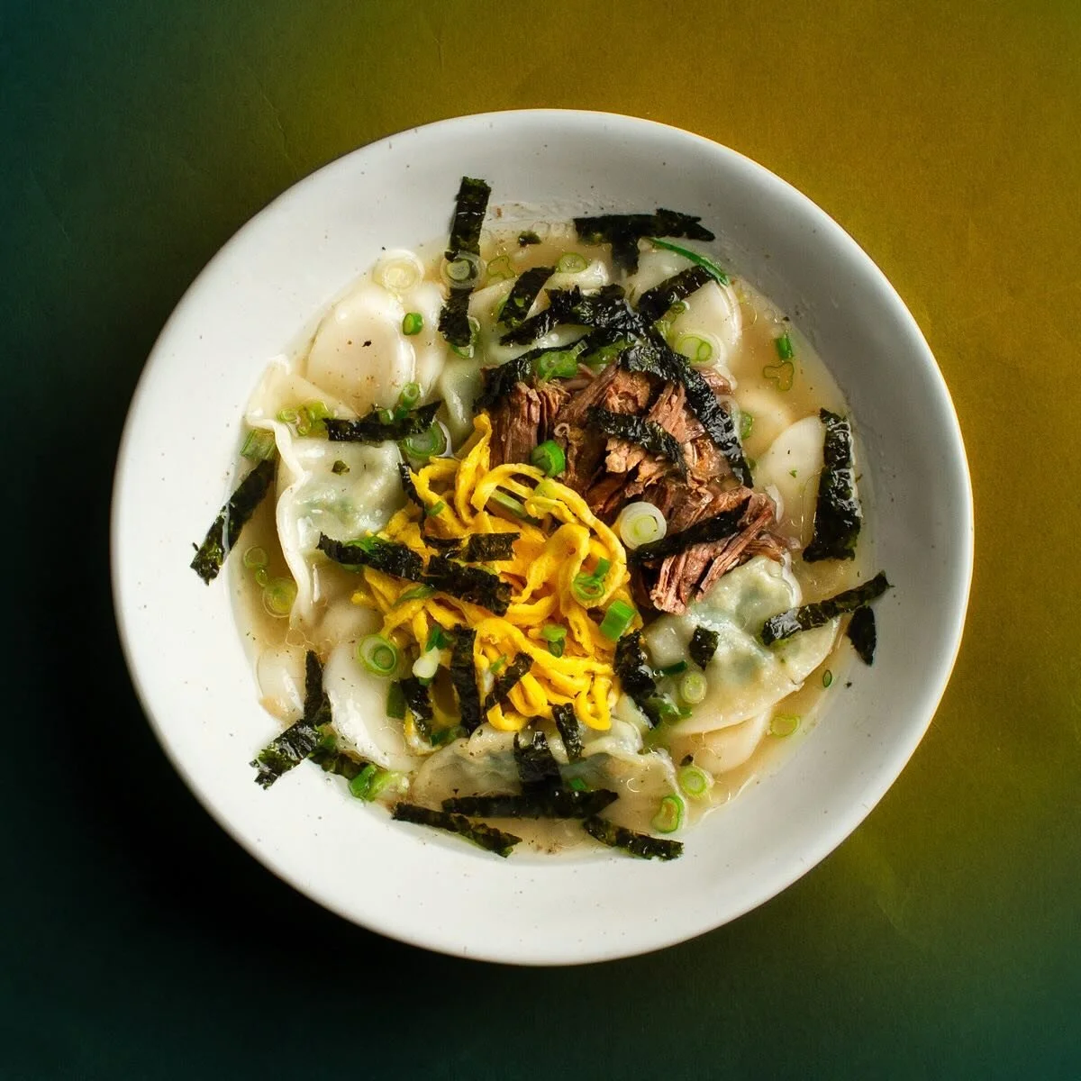 An attempt at Tteok Mandu Guk for Seollal (Korean Lunar New Year) from a few weeks back.

The new year kind of snuck up on me but luckily I&rsquo;d already purchased some beef (country style ribs I believe) that I figured would make a decent broth.
I