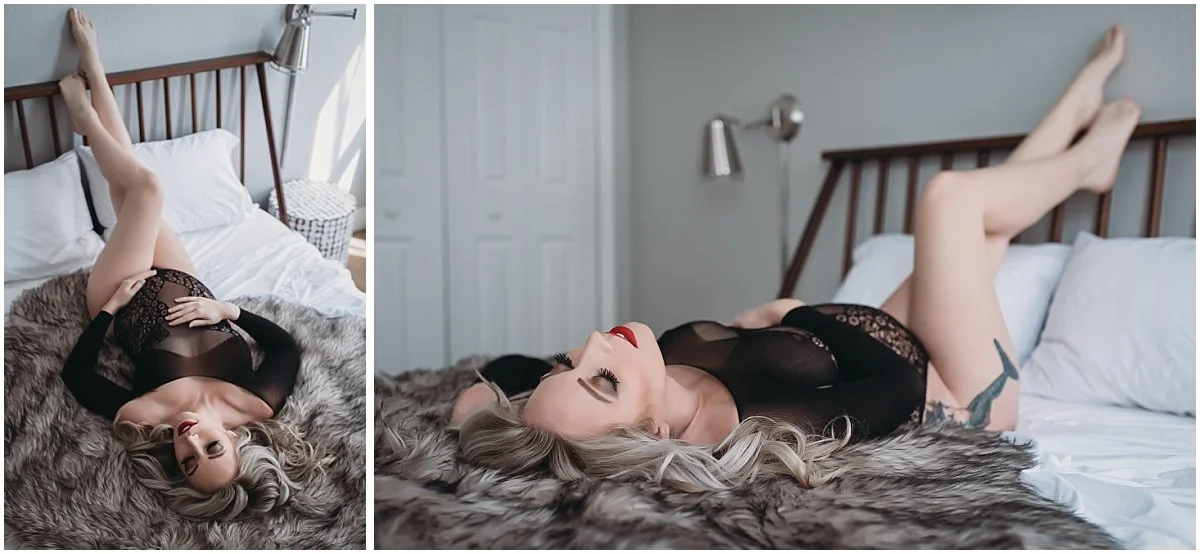 Pregnancy boudoir portrait of a blonde woman in black lingerie laying on a bed