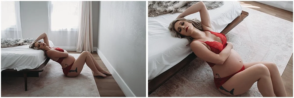 Sensual pregnancy boudoir session with blonde woman in red lingerie as she leans against the bed