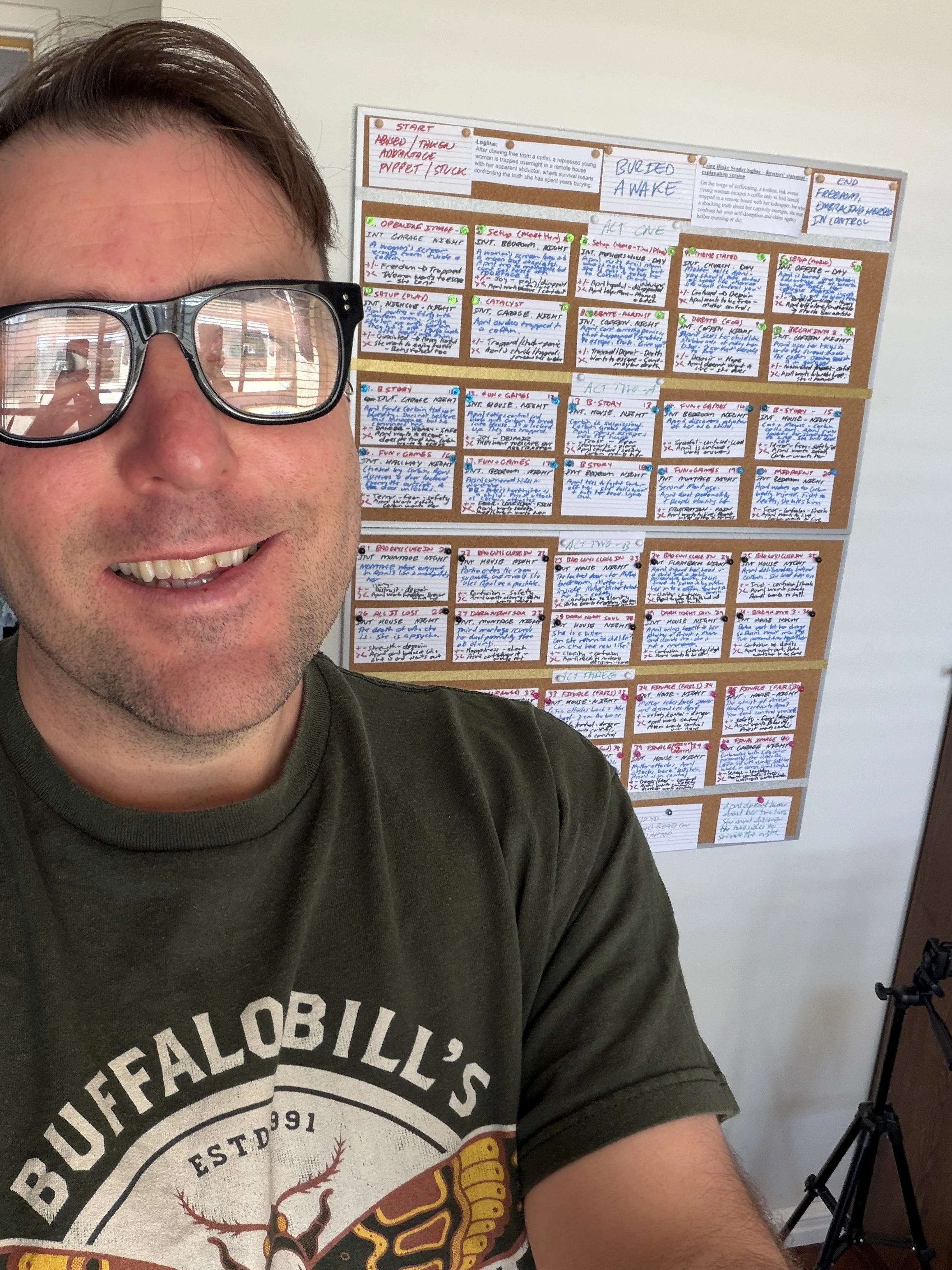 Filmmaker and scriptwriter Mark Regan in front of a beat board with the 40 index cards that make up the script of Buried Awake.