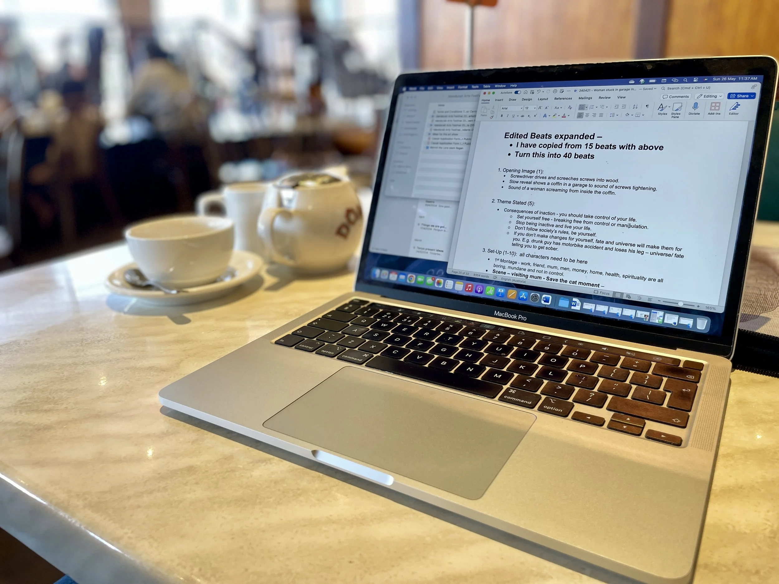 writing at coffe shop.jpg