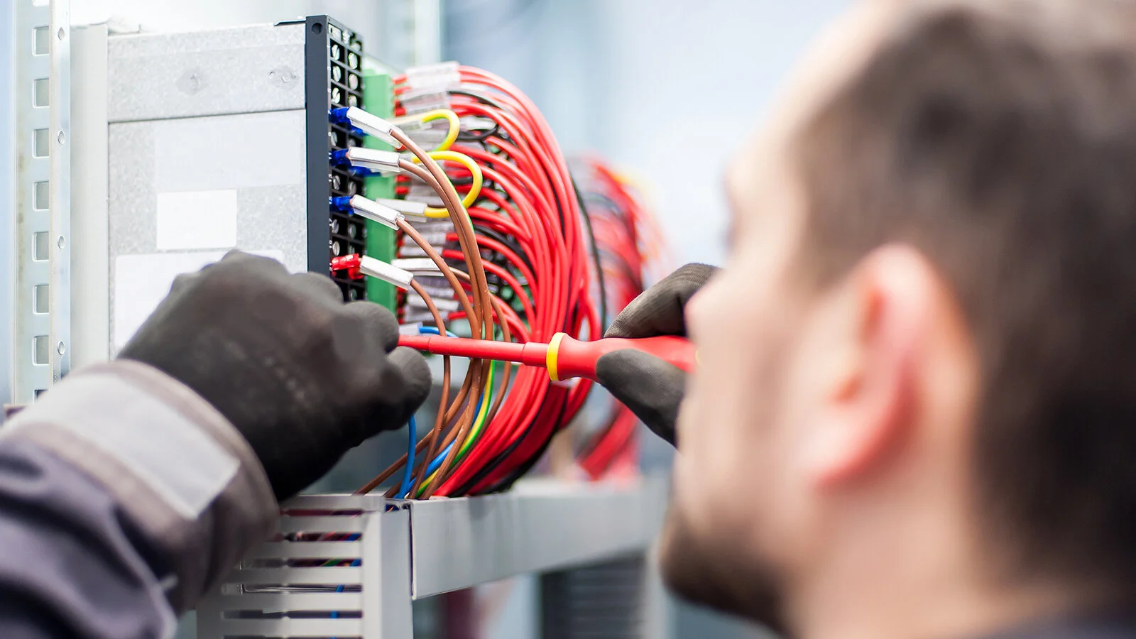 bigstock-Closeup-Of-Electrician-Enginee-239033158 v2.jpg