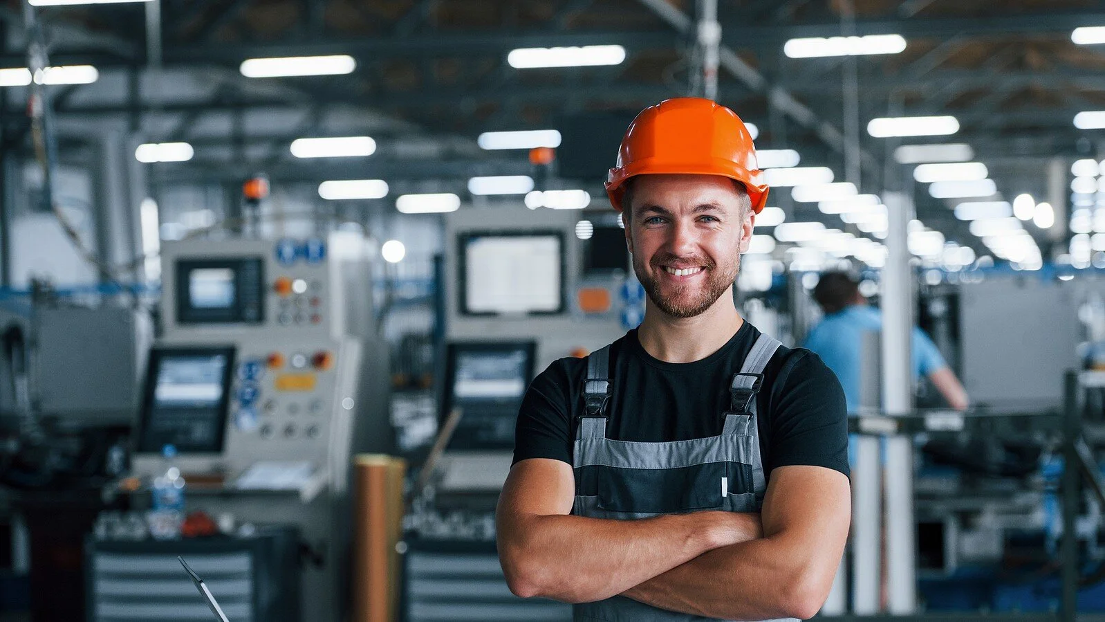 bigstock-Smiling-And-Happy-Employee-In-339629002 widescreen.jpg