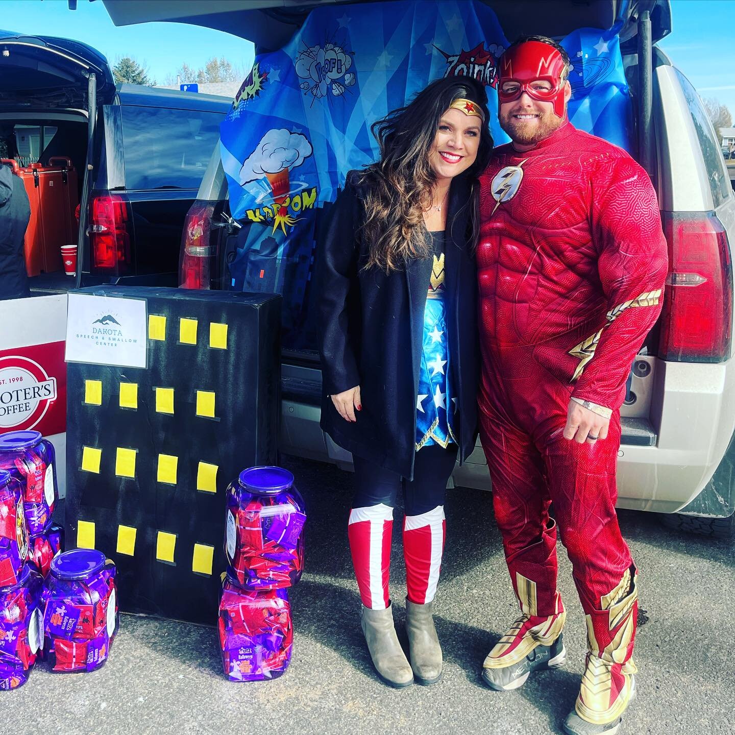 So fun being a part of the annual Rapid Valley trunk-or-treat! 👻 The wind and the cold got in the way of my elaborate trunk plans, but we still passed out 500 bags of cheese balls and I&rsquo;m so glad Flash showed up to help. 🎃#dakotaspeechandswal