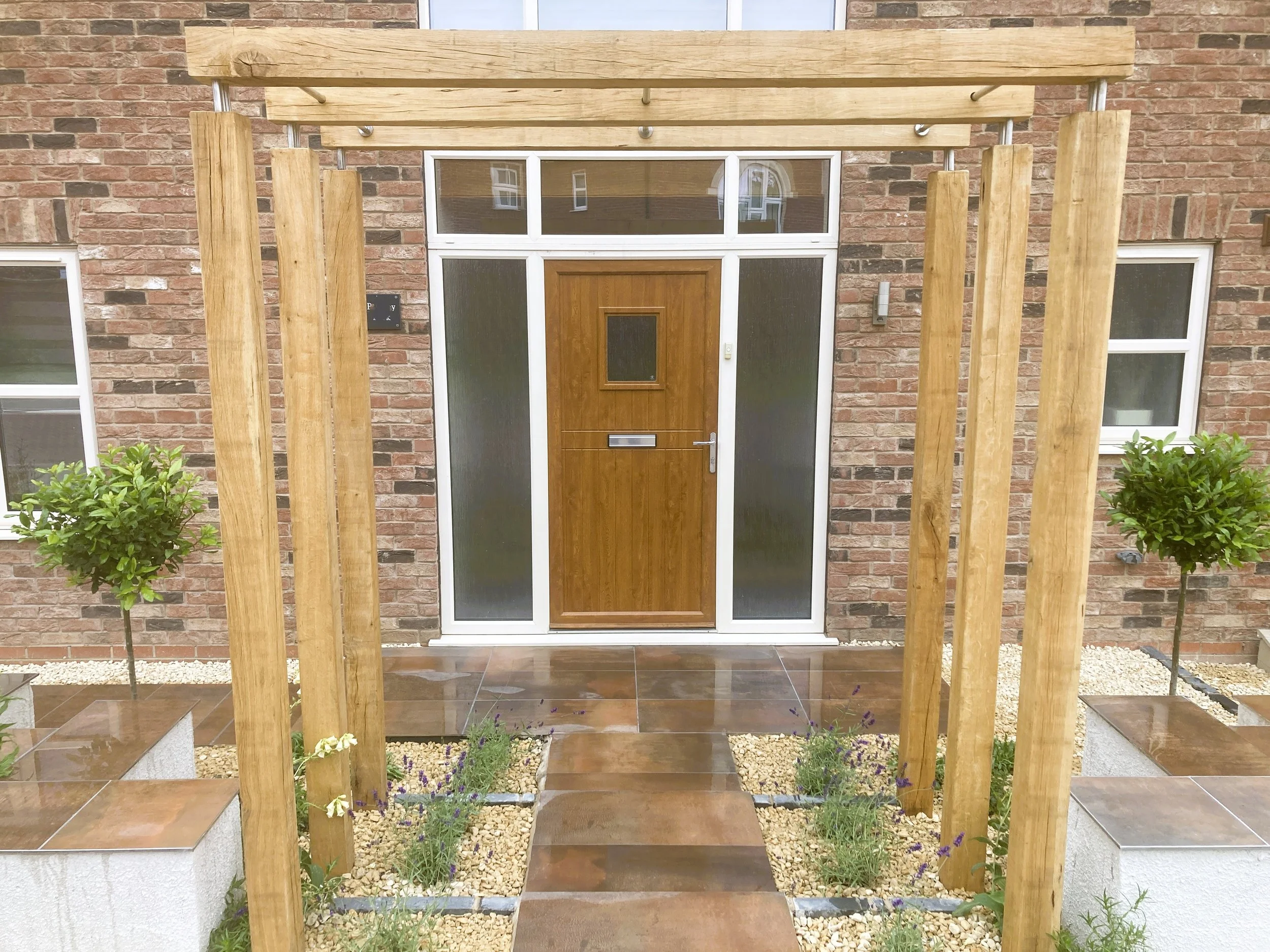 Bespoke contemporary pergola entrance for instant kerb appeal