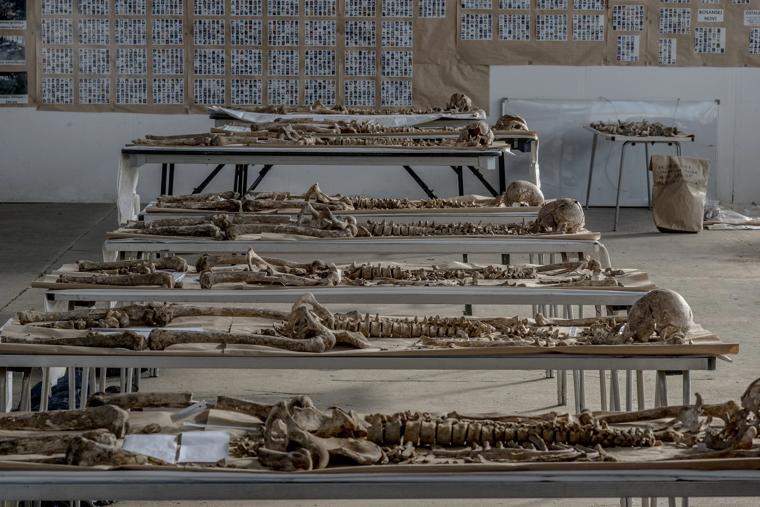  The remains of people massacred during the Bosnian war are laid out on tables at the Krajina Identification Project in Sanski Most. 