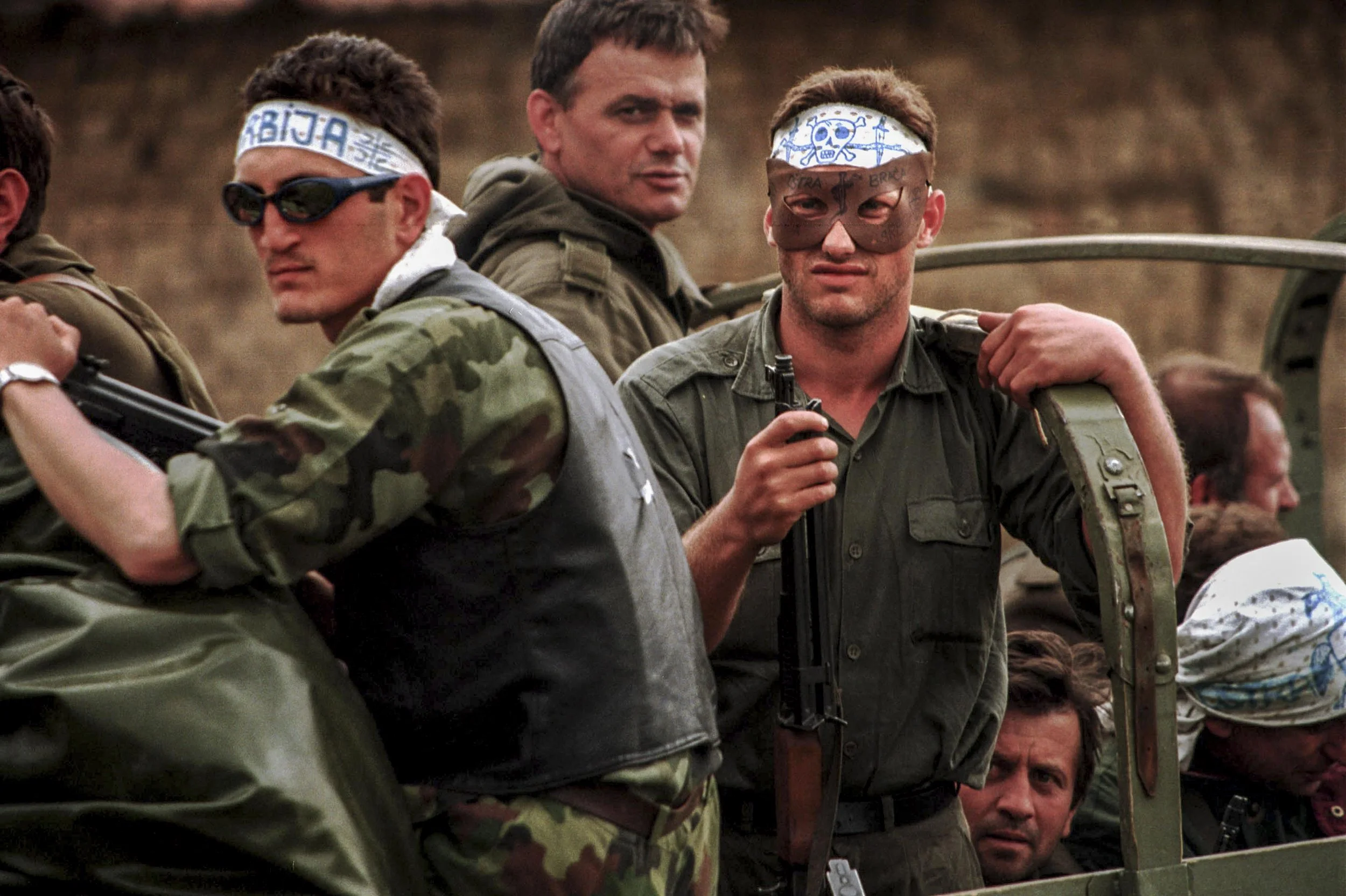  Serb Paramilitaries on a convoy of Serb units leaving Kosovo north of Podujevo. 18th June 1999. 