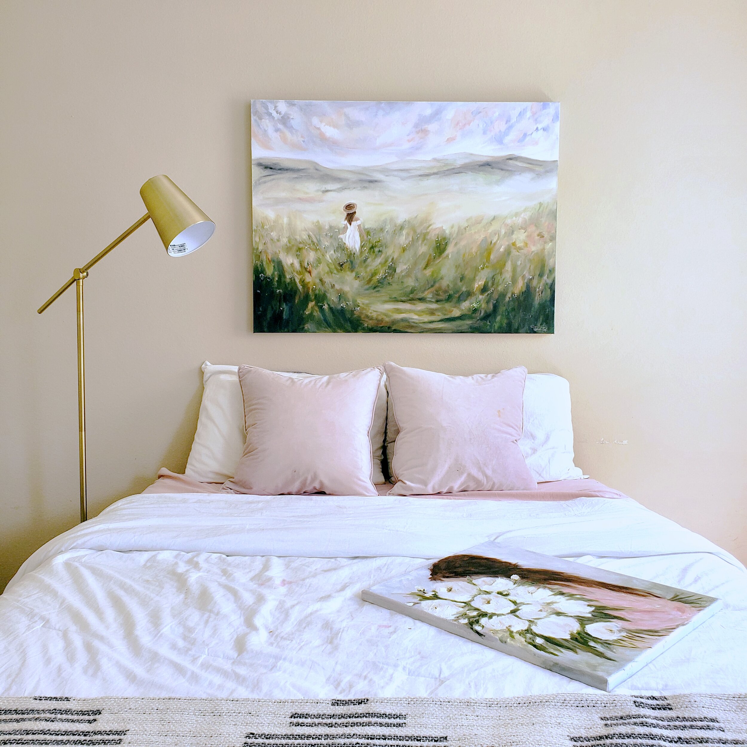 Large Landscape Oil Painting Above White Bed with Gold Lamp.jpeg