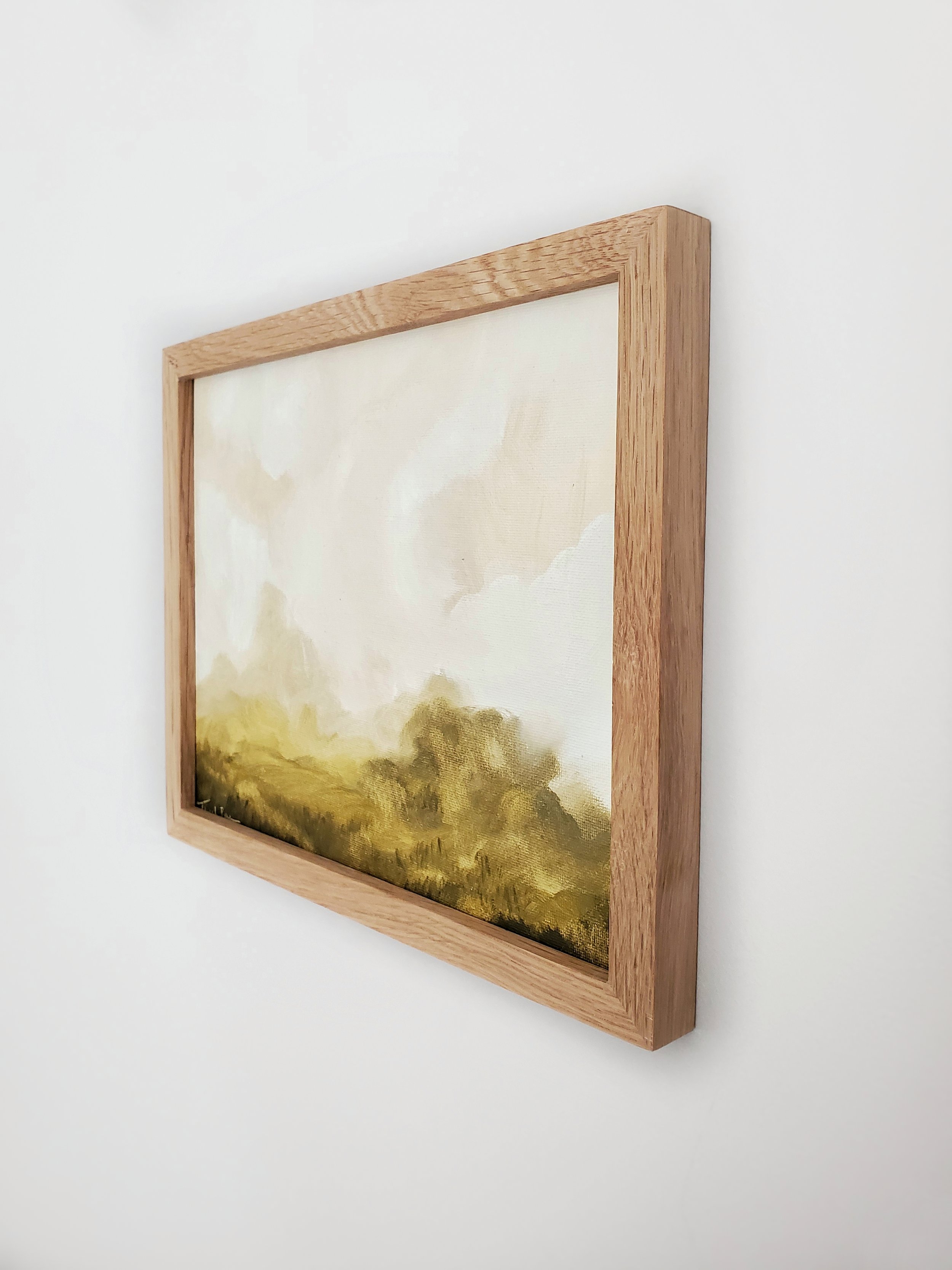 landscape art framed in natural wood frame.jpeg
