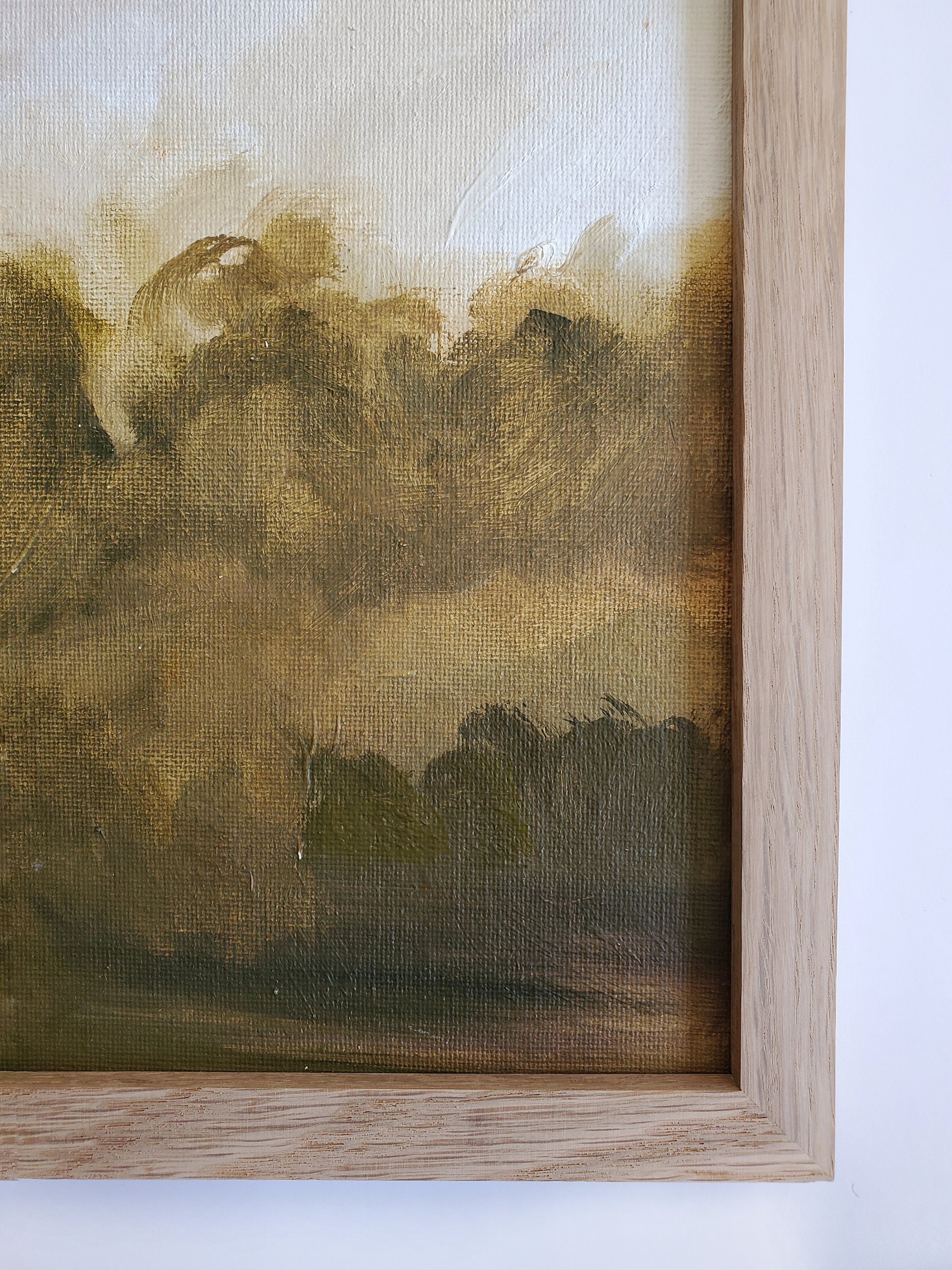 warm green landscape painting with oak frame.jpeg