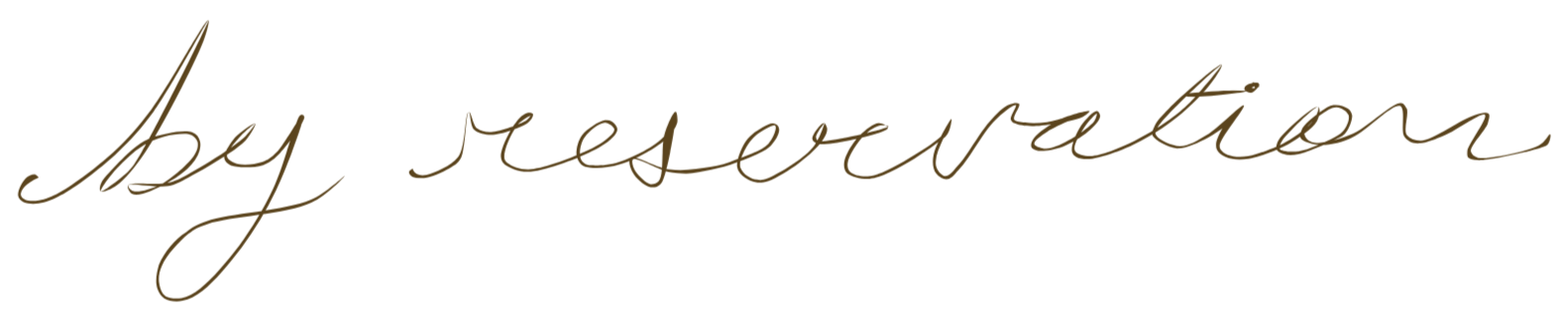 Stylized handwritten text that reads "by reservation"