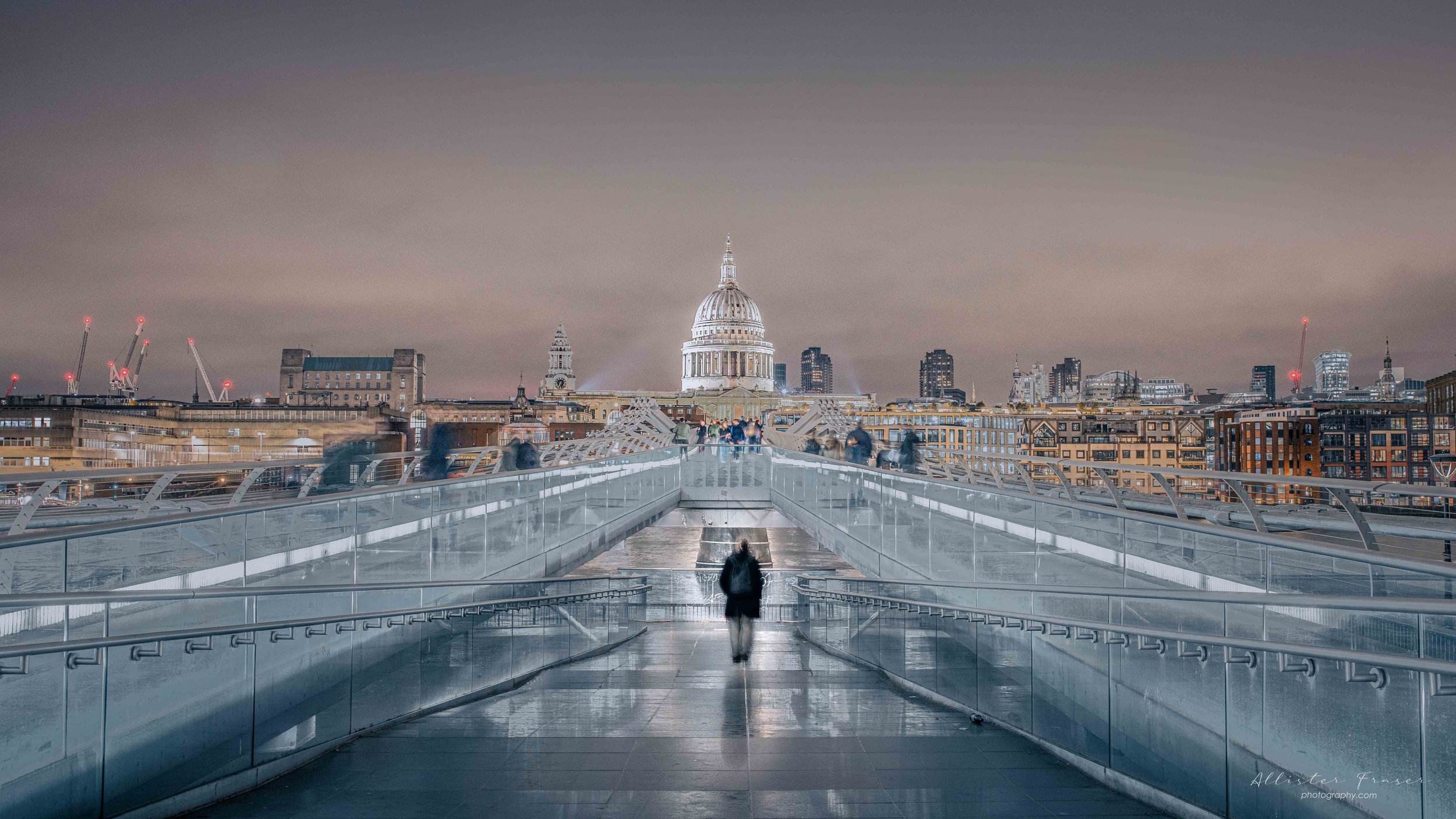 lone figure exitng the millennium bridge ramp