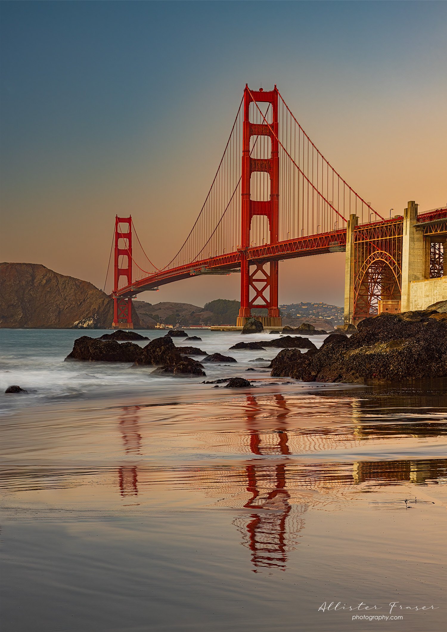 golden gate post-sunset glow from mitchell's beach
