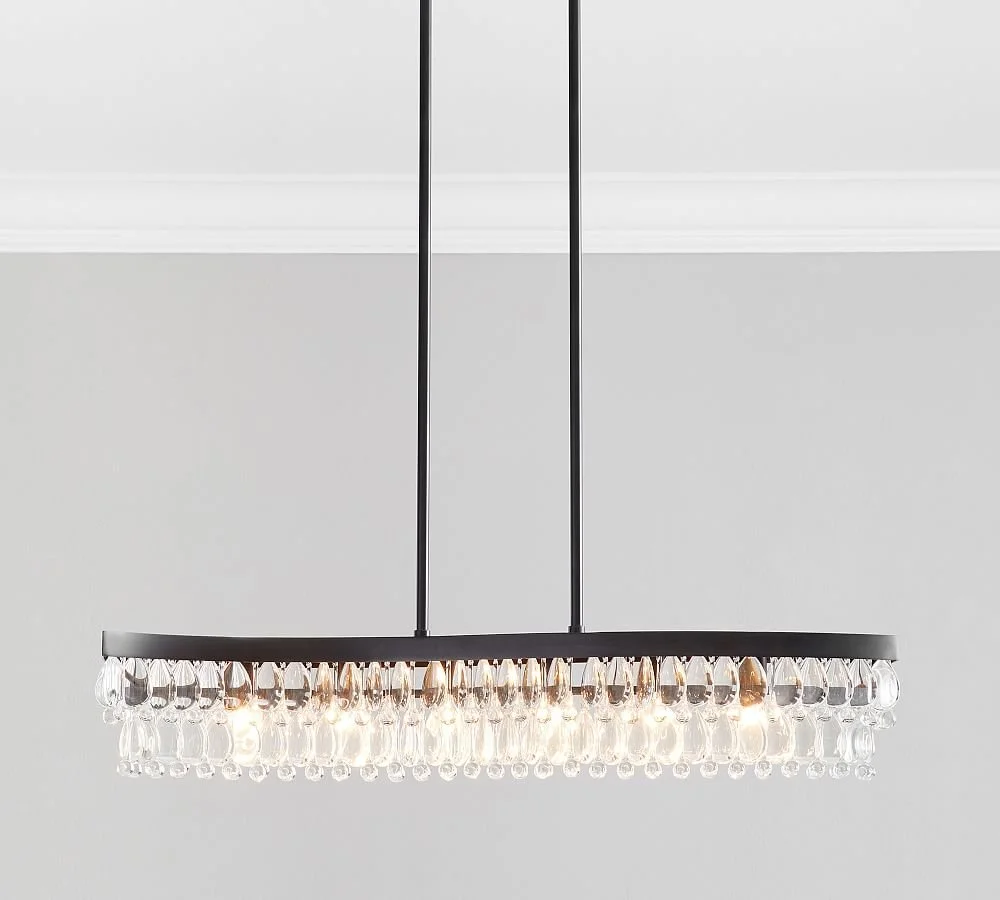 The modern Clarissa lighting collection for Pottery Barn was designed by Industrial Designer CoCo Ree Lemery in 2020. Inspired by the vintage crystal chandelier collection, the modern take ended up becoming a best-seller for the Williams Sonoma brand