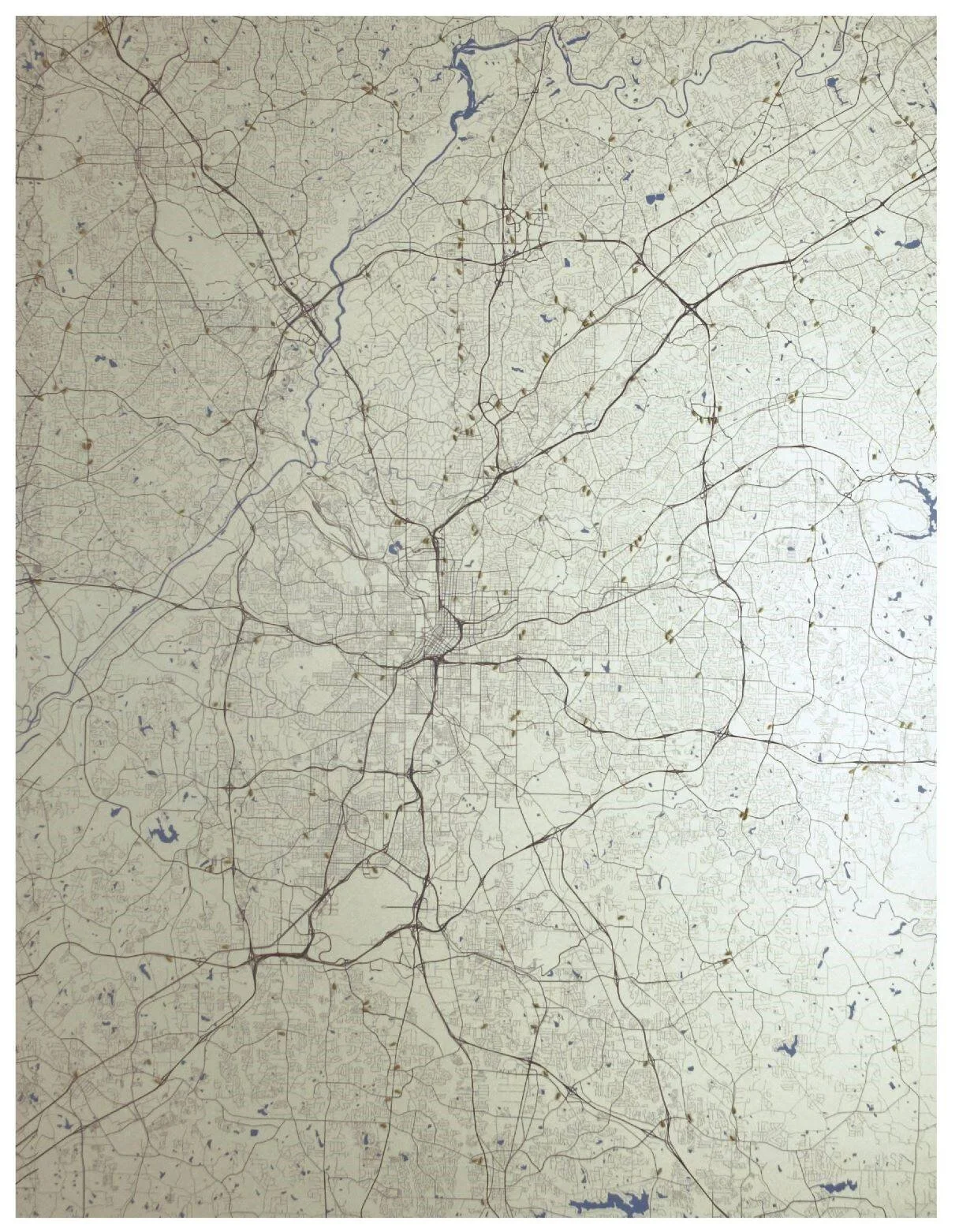 A detailed map showing roads, highways, and bodies of water in an urban area, likely a city and its surrounding suburbs.