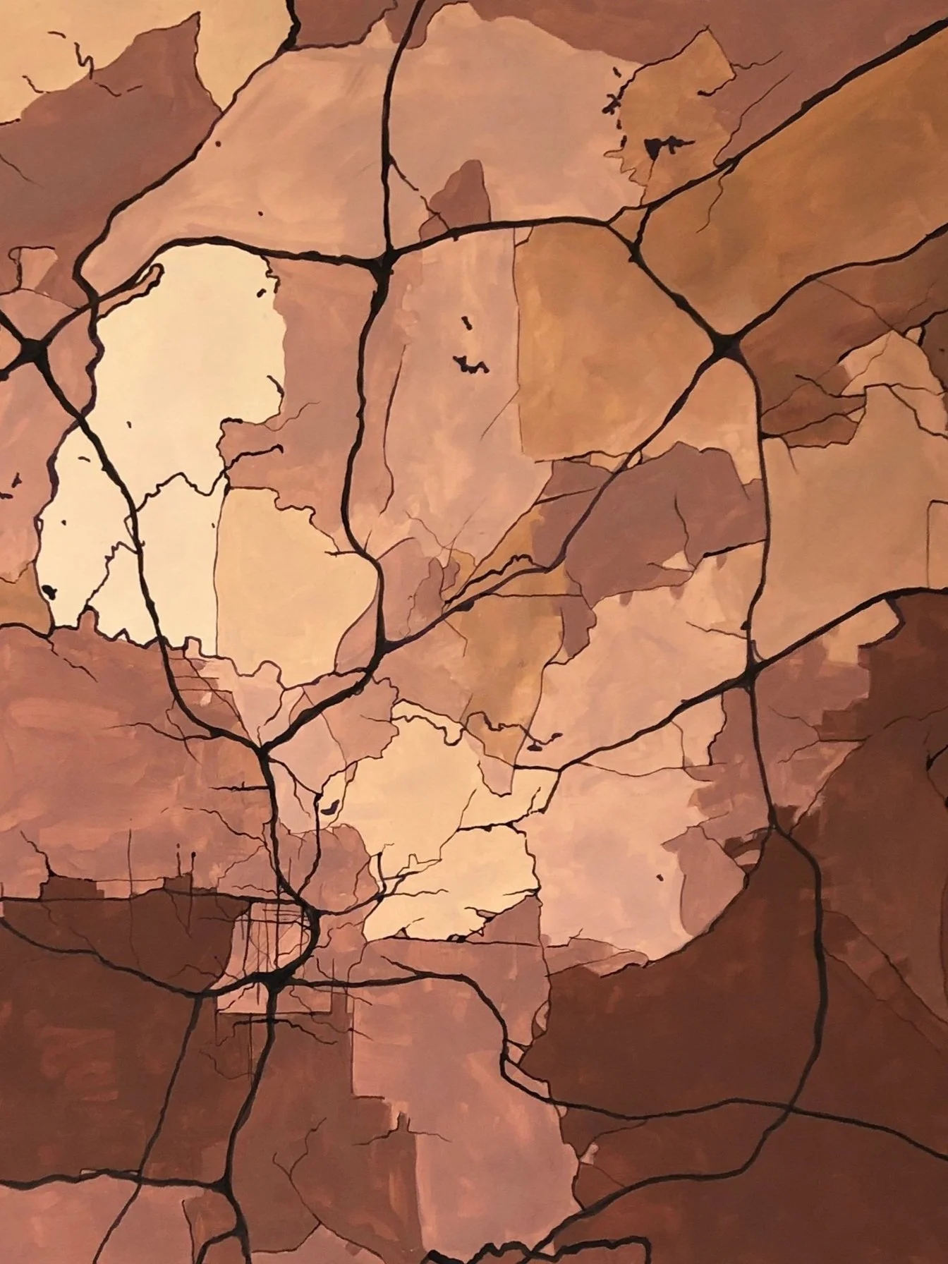 Abstract map with various shades of brown and black streets outlined, resembling a geographic or city map.