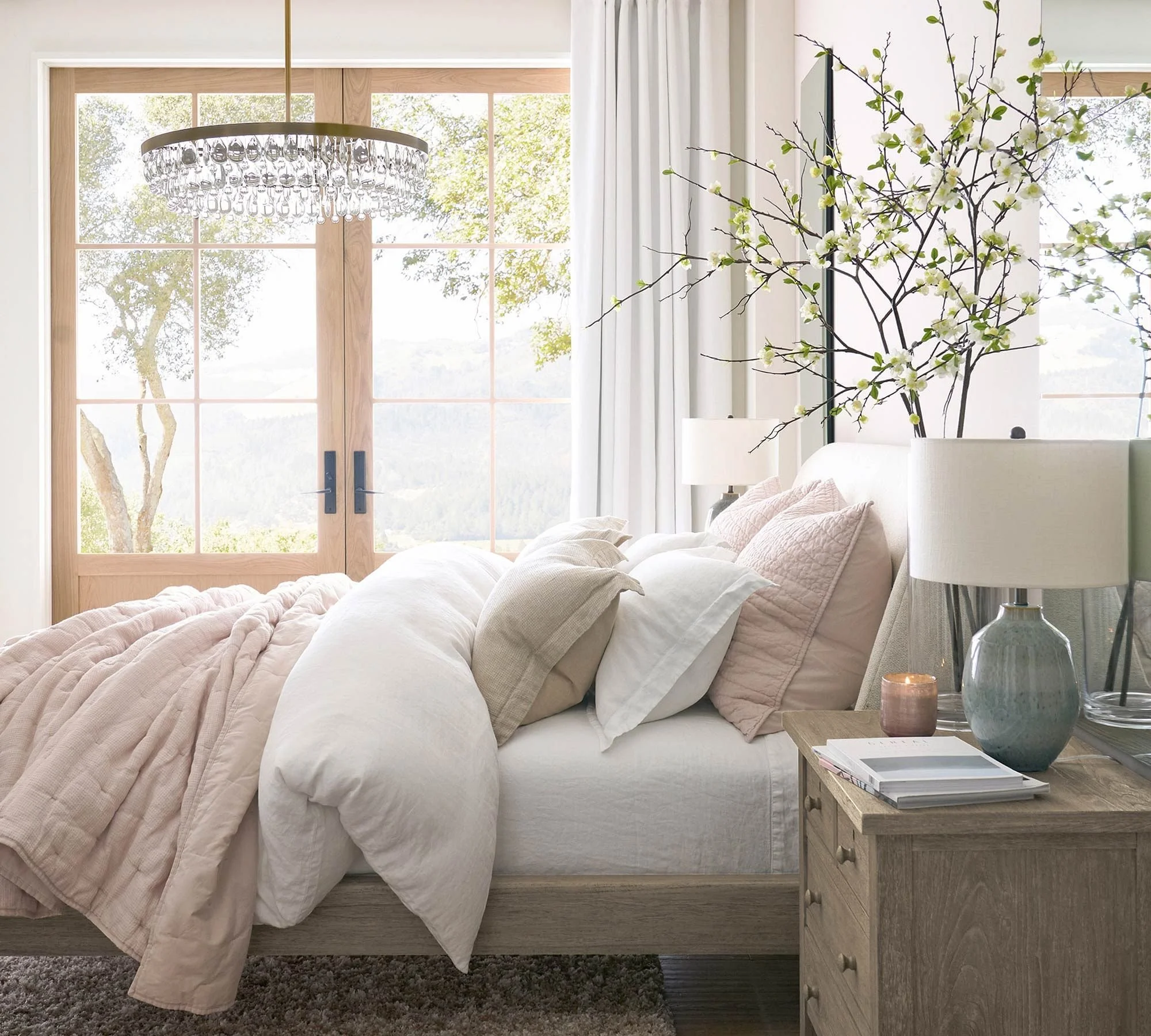 The modern Clarissa lighting collection for Pottery Barn was designed by Industrial Designer CoCo Ree Lemery in 2020. Inspired by the vintage crystal chandelier collection, the modern take ended up becoming a best-seller for the Williams Sonoma brand