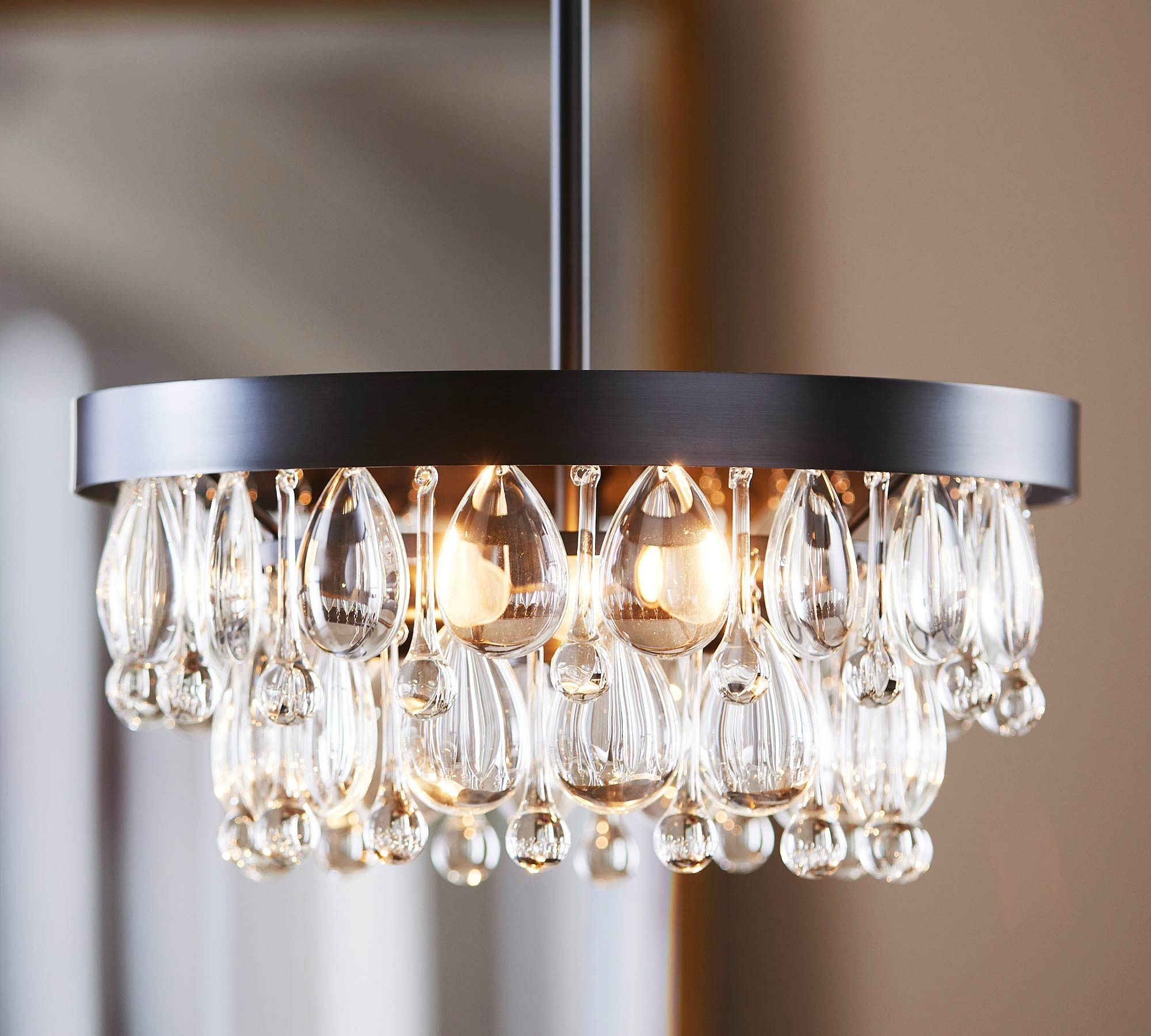 The modern Clarissa lighting collection for Pottery Barn was designed by Industrial Designer CoCo Ree Lemery in 2020. Inspired by the vintage crystal chandelier collection, the modern take ended up becoming a best-seller for the Williams Sonoma brand