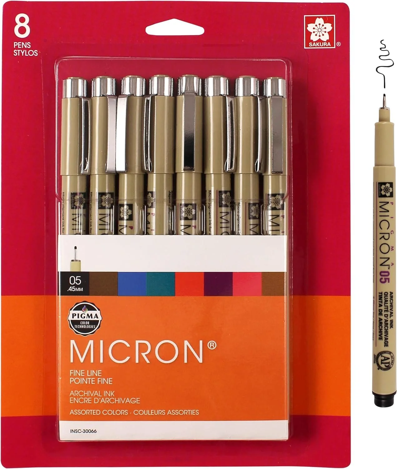 Box of 8 Sakura Micron fine line pens in assorted colors, with one pen outside the box showing the fine tip and labeled with the Micron 05 size.