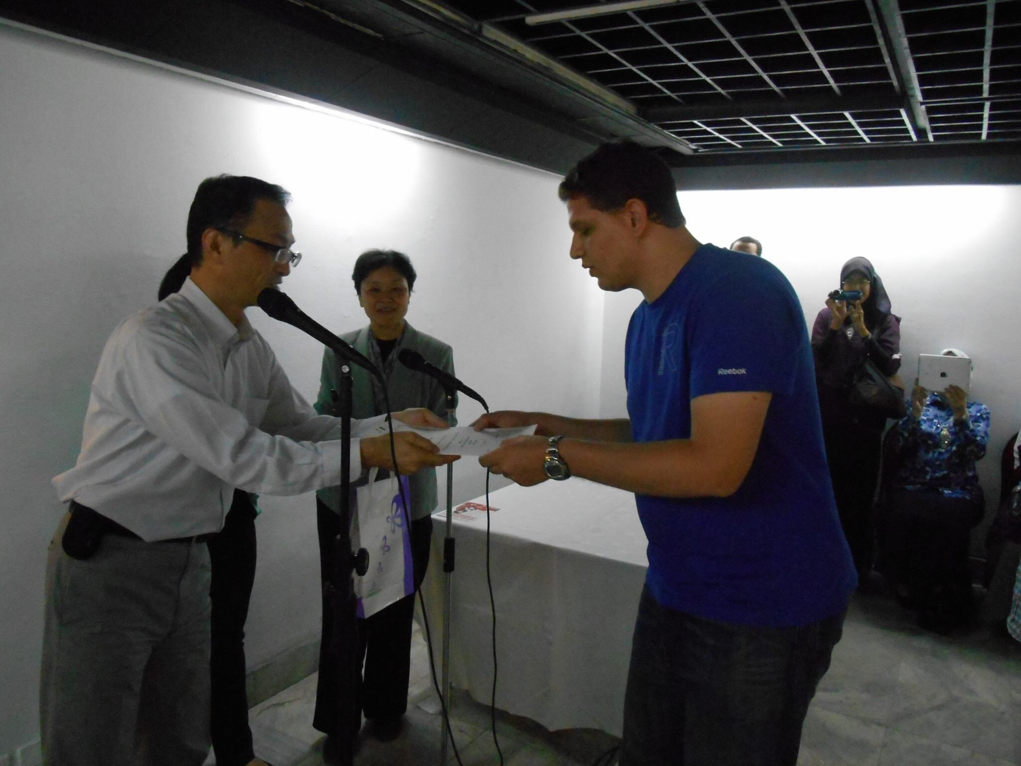 Accepting the Award Certificate